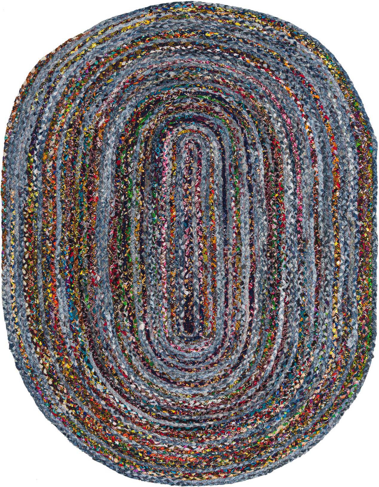 An oval 5'1" x 8'0" braided denim cotton rug in blue and multi-color, featuring an eclectic, textured flatweave design.