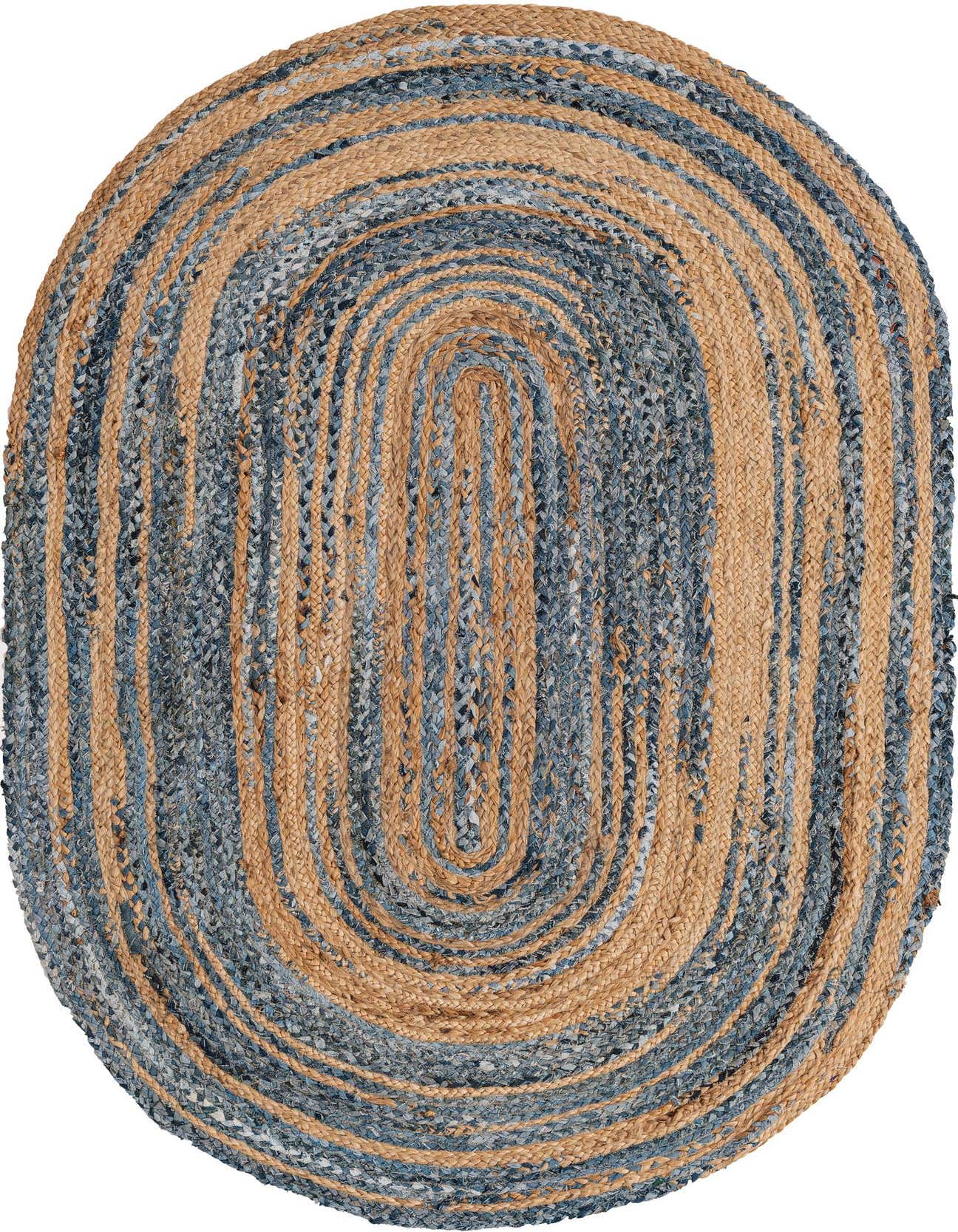 An oval 5'1" x 8'0" braided rug featuring alternating stripes of natural jute and blue denim, showcasing a textured, eclectic design.