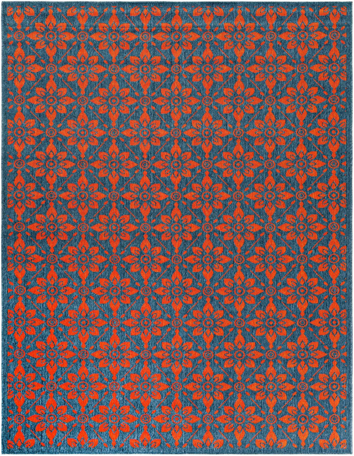 A 6x9 rectangular Rugs.com Outdoor Lattice rug featuring a modern abstract floral pattern in vibrant red against a deep blue background.