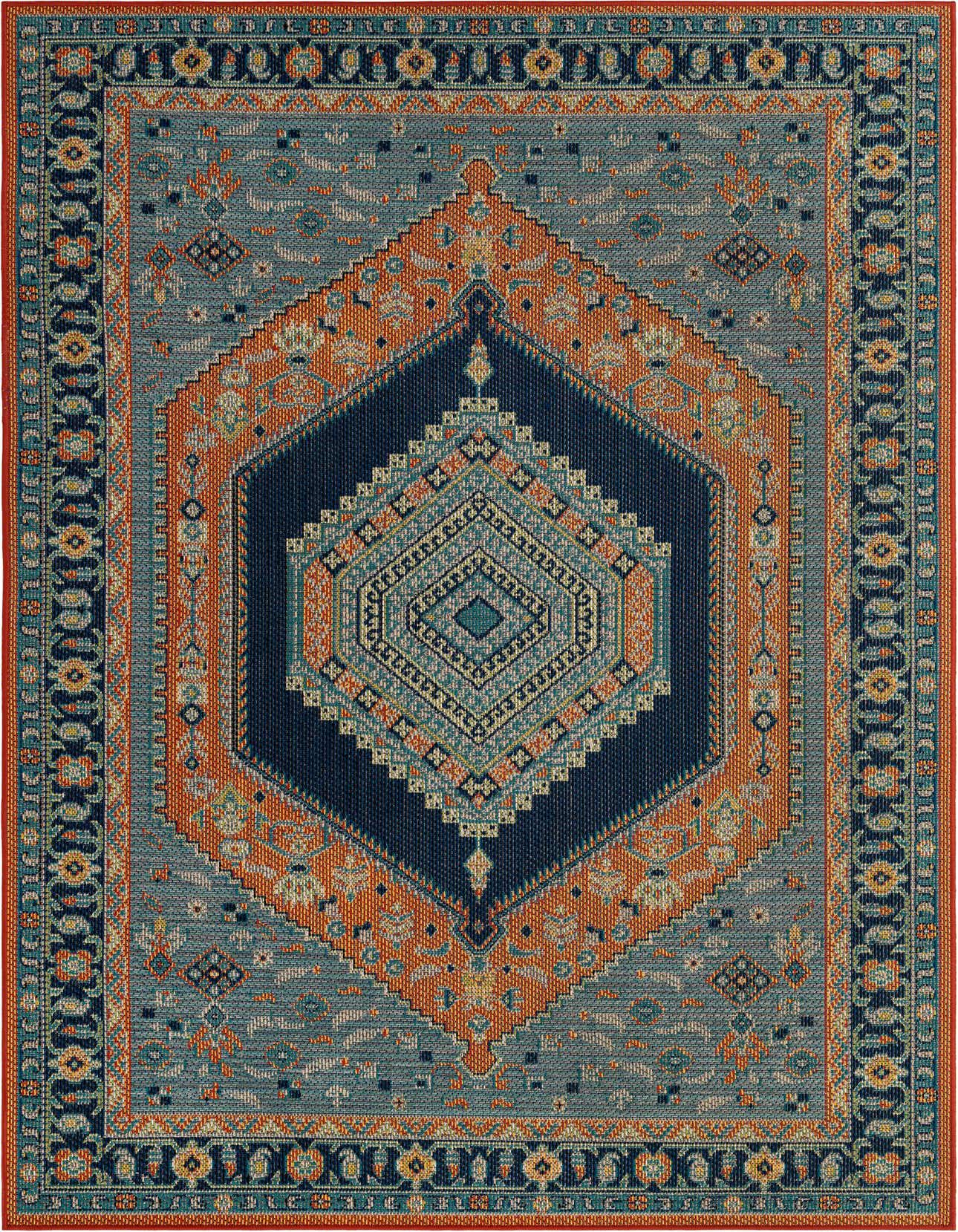 A 6x9 rectangular Baja Outdoor rug featuring a traditional medallion pattern in blue, rust red, and orange tones.
