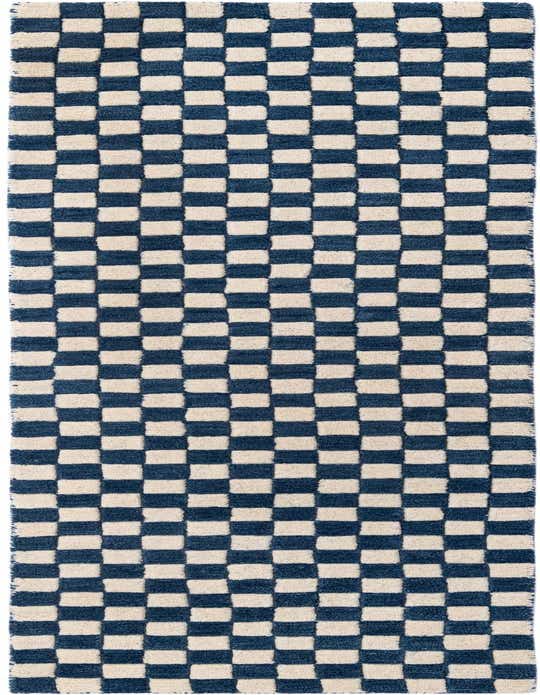 A long, rectangular 8 ft runner rug featuring a bold blue and white checkerboard pattern with a high, textured pile.