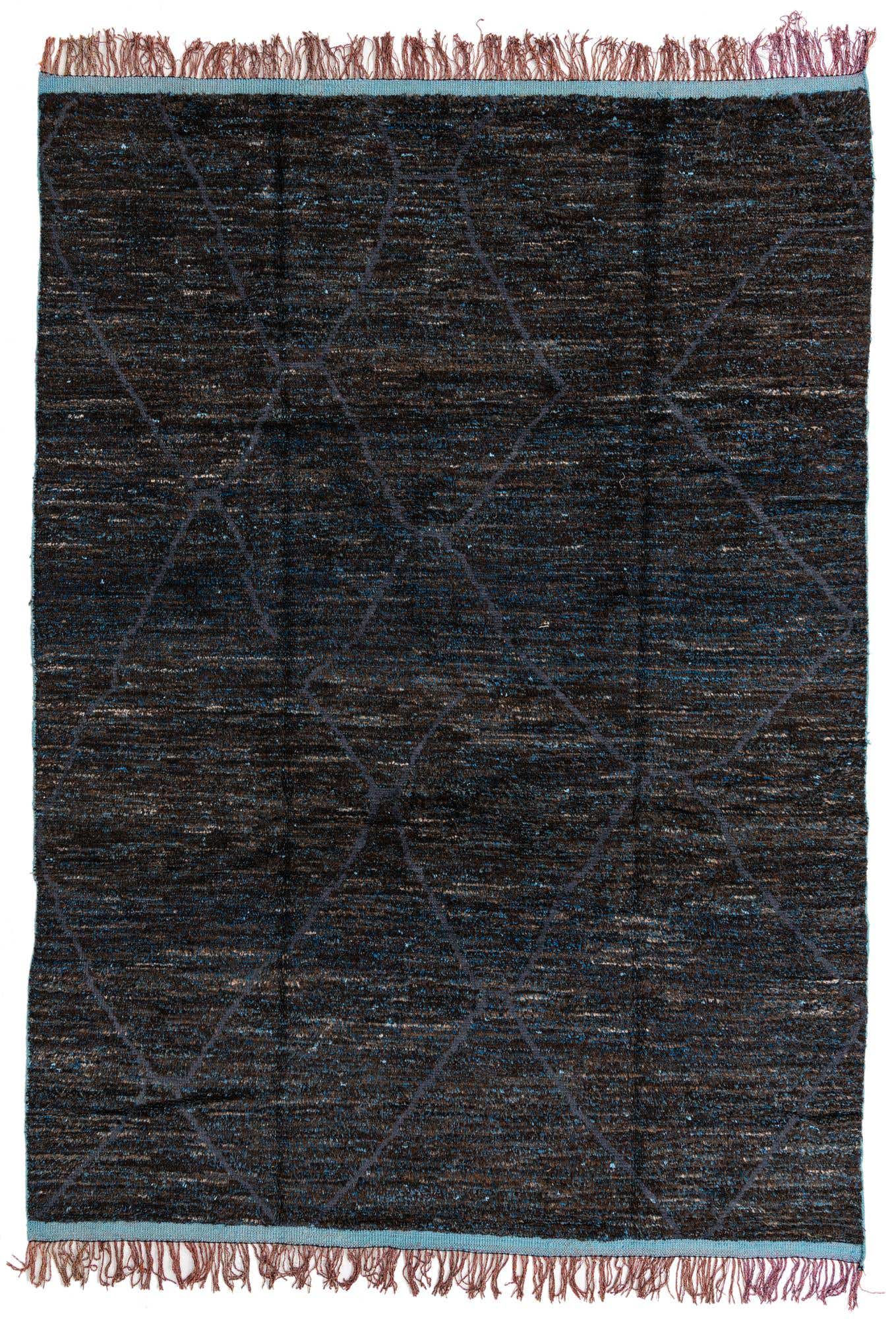 A 9x12 rectangular blue and brown Moroccan shag rug with a subtle tribal diamond pattern, handmade from wool.