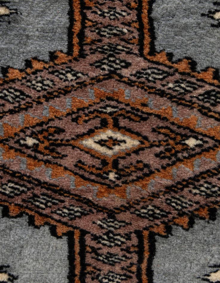 Detail image of  4' 2 x 5' 9  Hand Knotted Bokhara Wool Rug