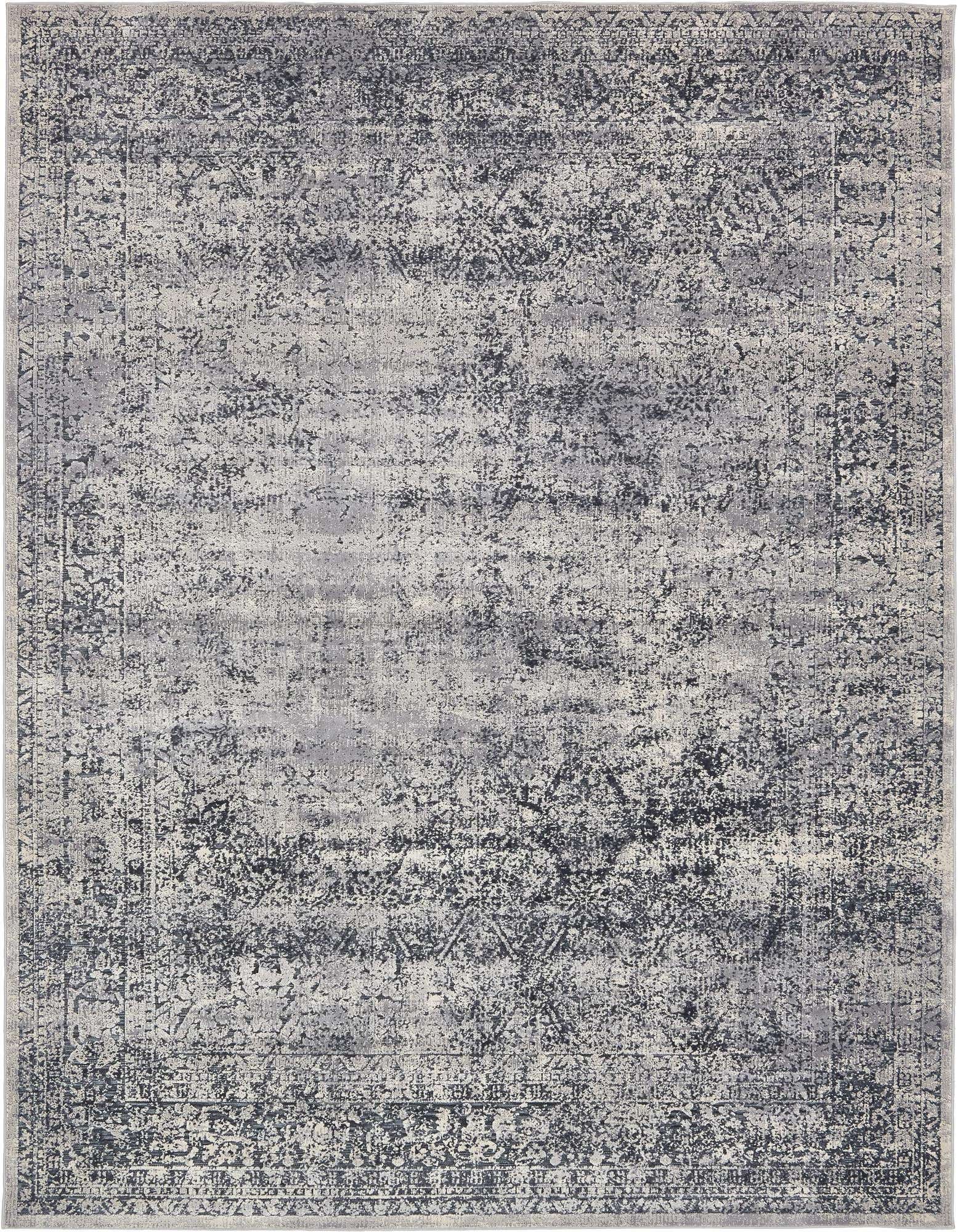 An 8x10 rectangular Eliza collection rug by Rugs.com, featuring a distressed traditional botanical pattern in blues and grays, suitable for a living room.