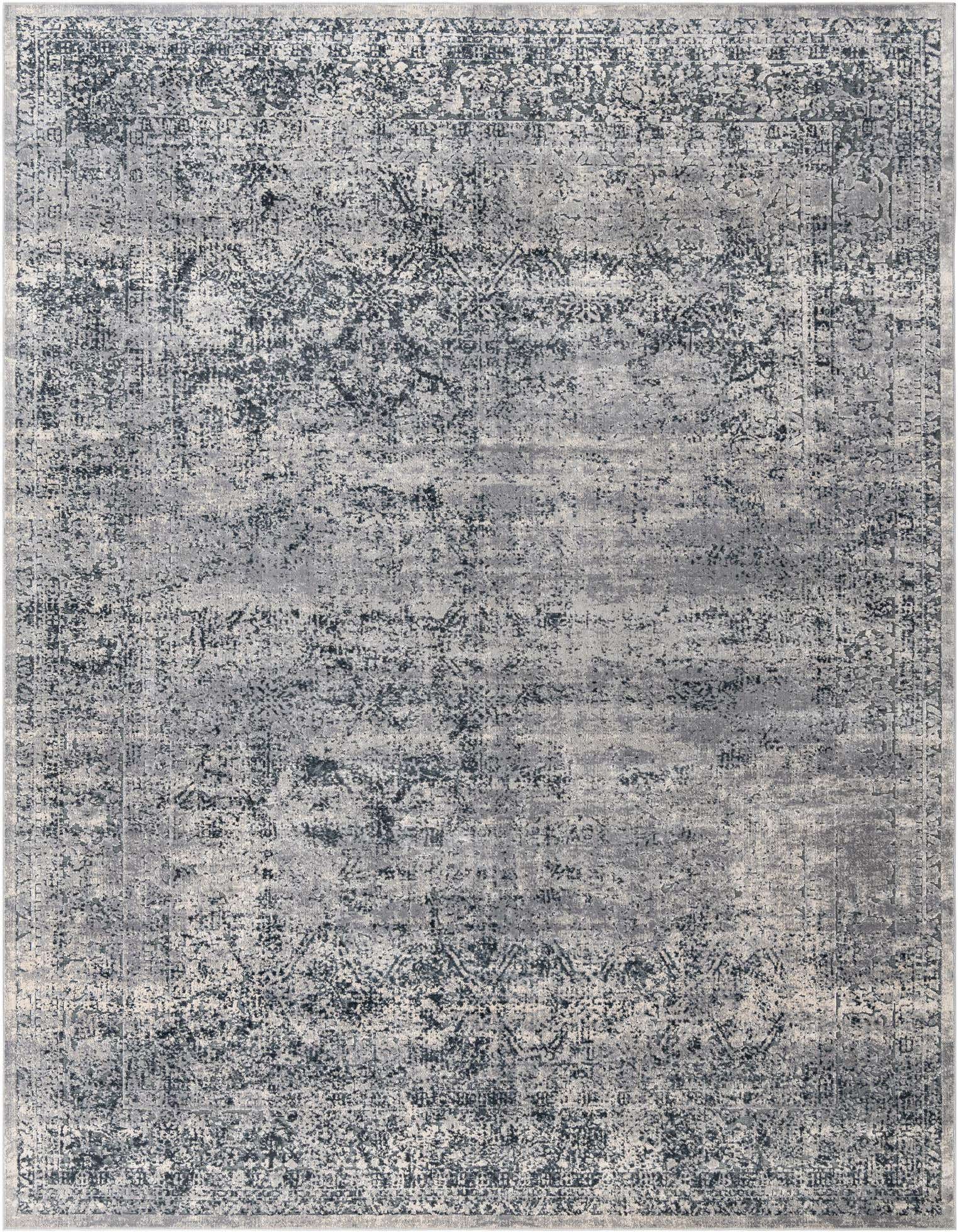 A 10x13 rectangular Eliza collection rug in blues and grays, featuring a distressed transitional pattern.
