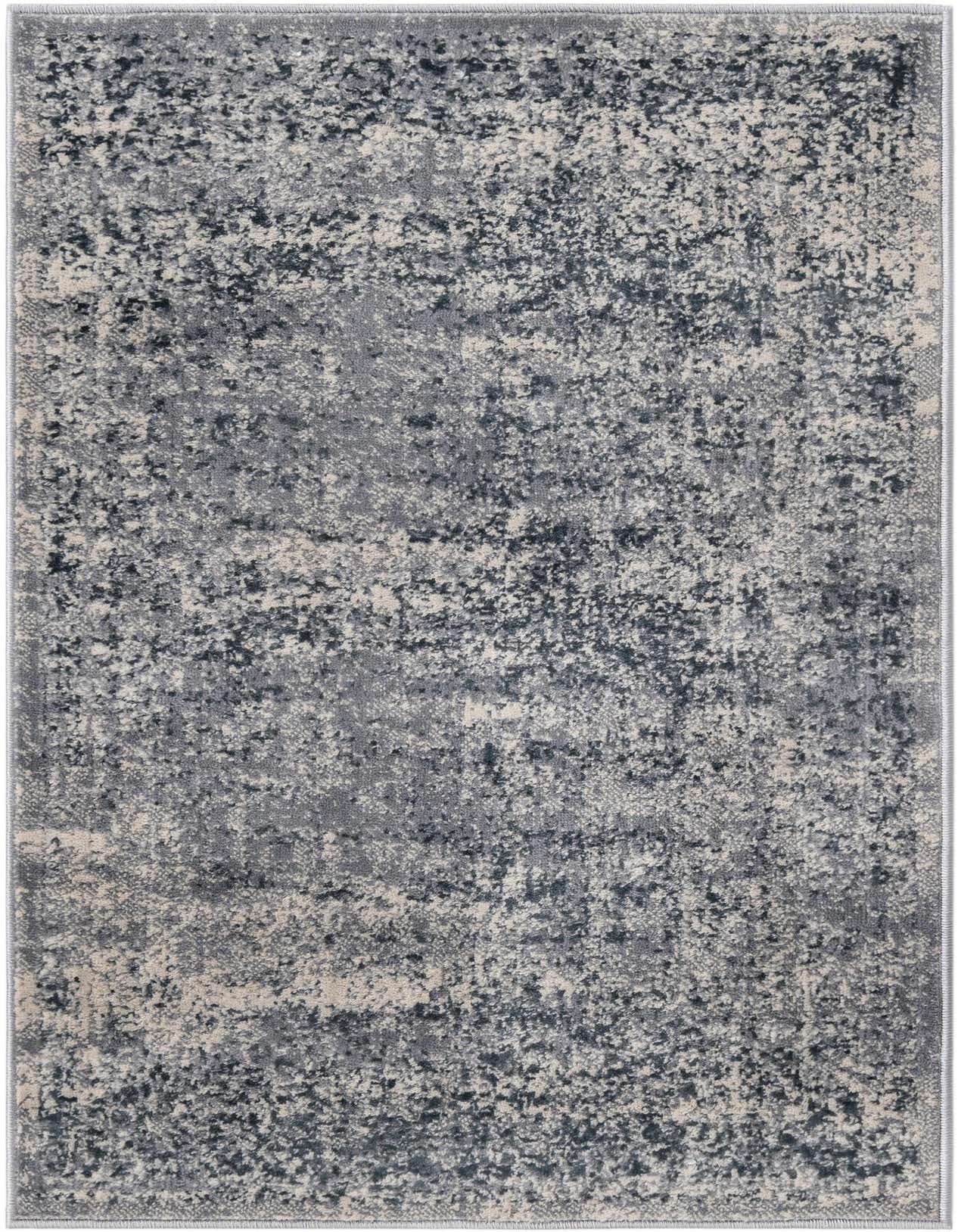 A 2x3 rectangular Rugs.com Eliza rug featuring an abstract distressed pattern in shades of blue and gray, ideal for an indoor space.