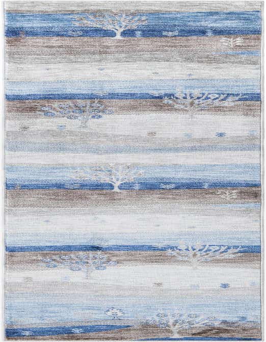 A 10 ft runner rug featuring a modern tribal pattern with horizontal stripes in various blues, grays, and silvers, accented with stylized trees and geometric motifs.