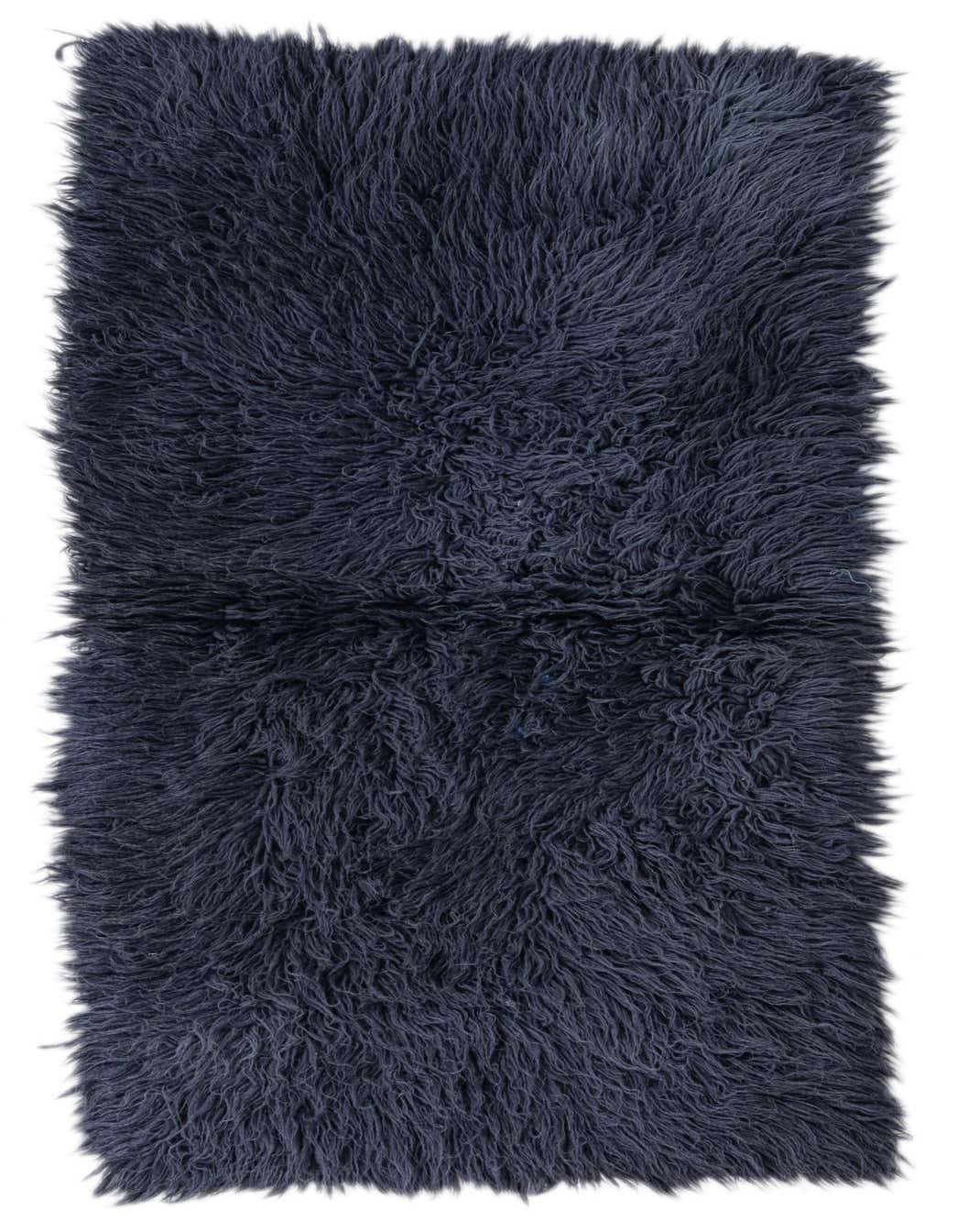 A plush 4 ft runner rug in deep blue-gray shag wool, perfect for adding warmth to a hallway.