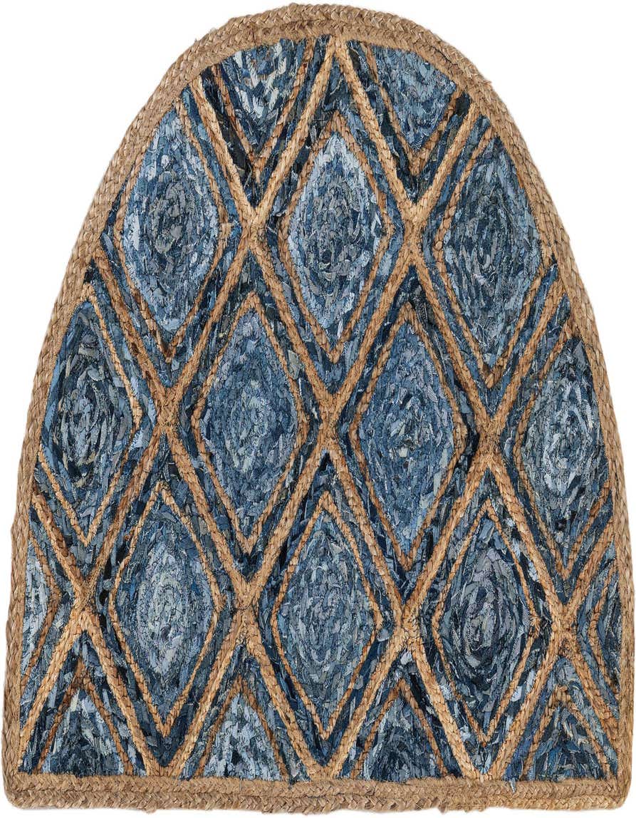 A half-round hearth rug featuring a diamond pattern of blue recycled denim squares outlined by natural braided jute.