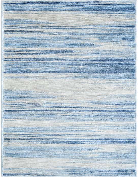 A 10 ft runner rug featuring a modern coastal design with horizontal stripes in various shades of blue, ivory, and white.