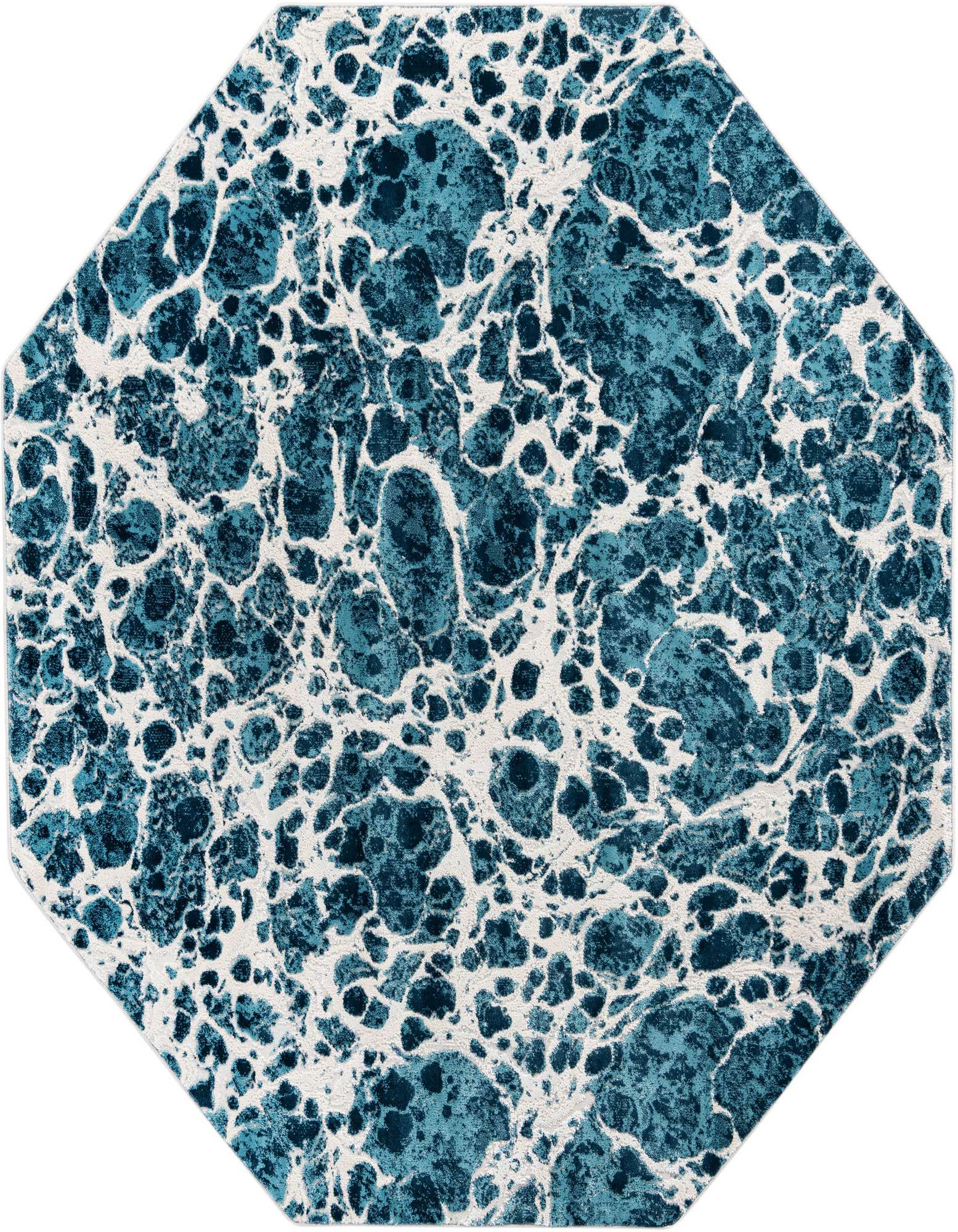 Octagon-shaped blue and white abstract rug with a textured, marbled pattern, evoking a coastal or modern feel.