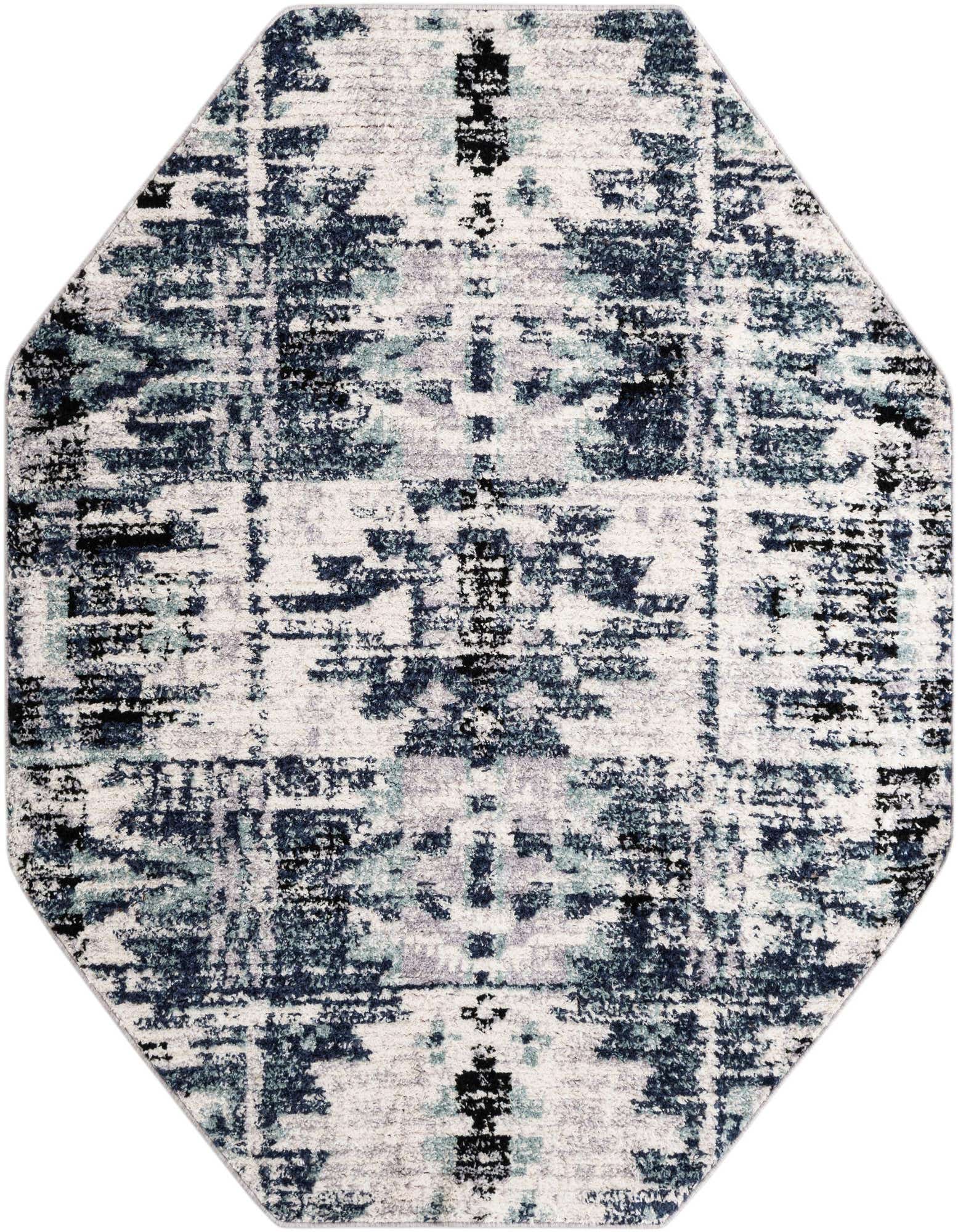 Octagon shag rug with an abstract Southwestern pattern in shades of blue, grey, and white.