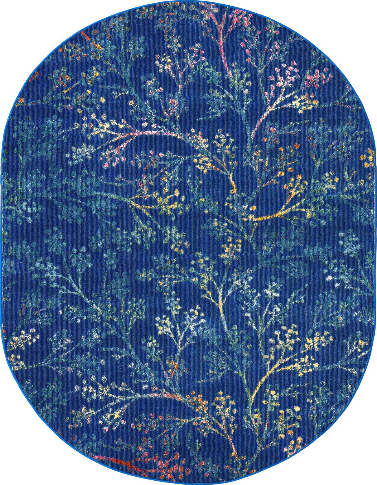An oval blue rug with a delicate botanical pattern featuring light blue, pink, and yellow branches and small leaves.