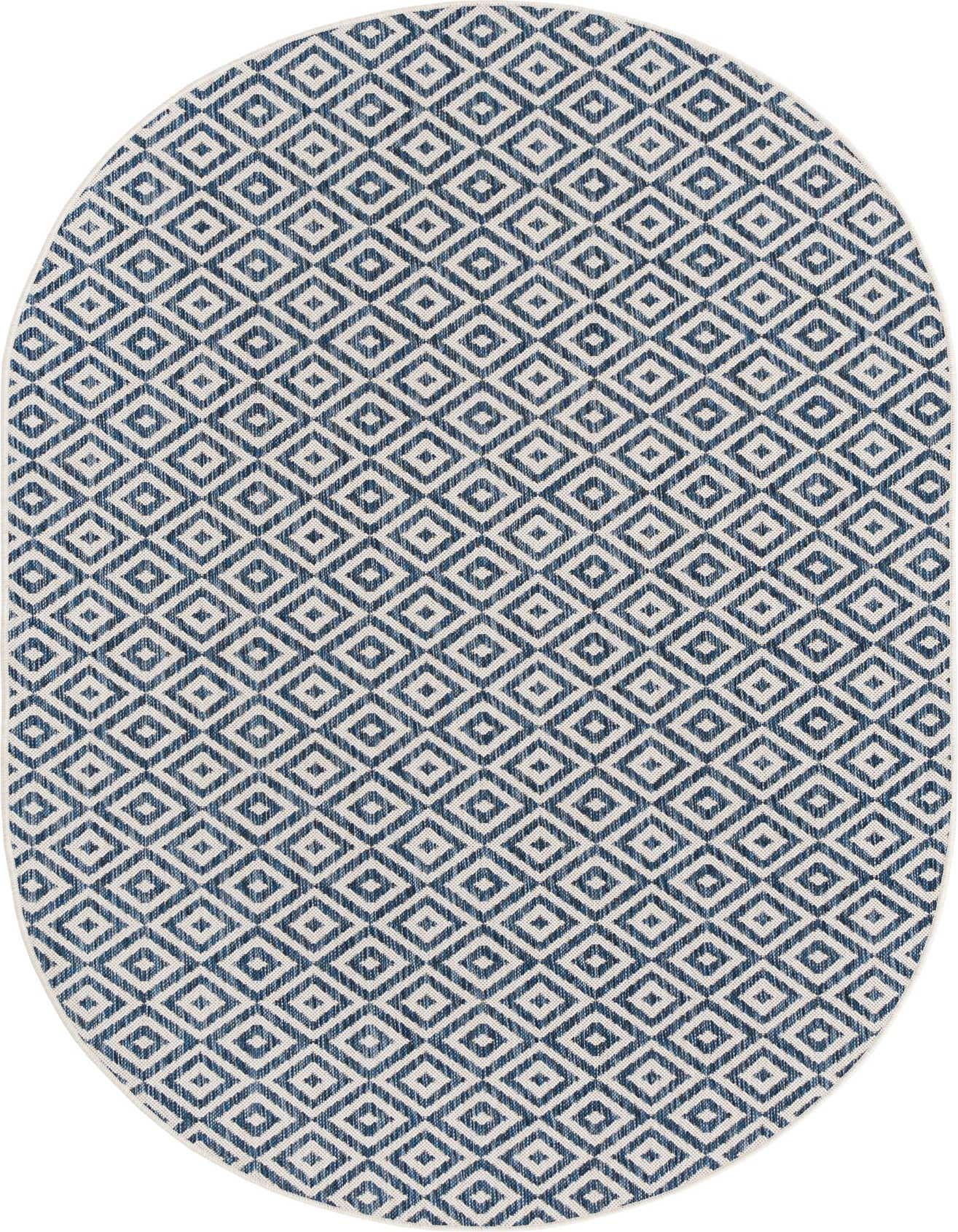 An oval 5'3" x 8'0" blue and white bohemian trellis rug, suitable for indoor or outdoor use.