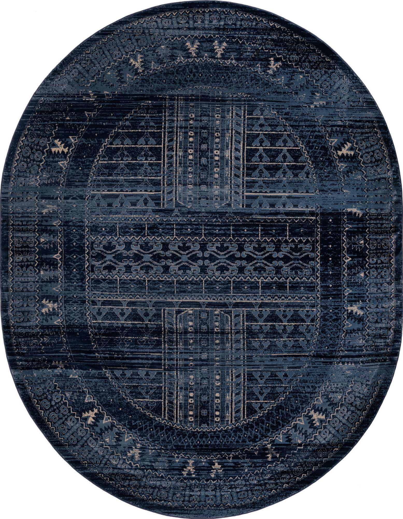 An 8' x 10' oval blue Southwestern rug with intricate traditional patterns in lighter blue and beige tones.