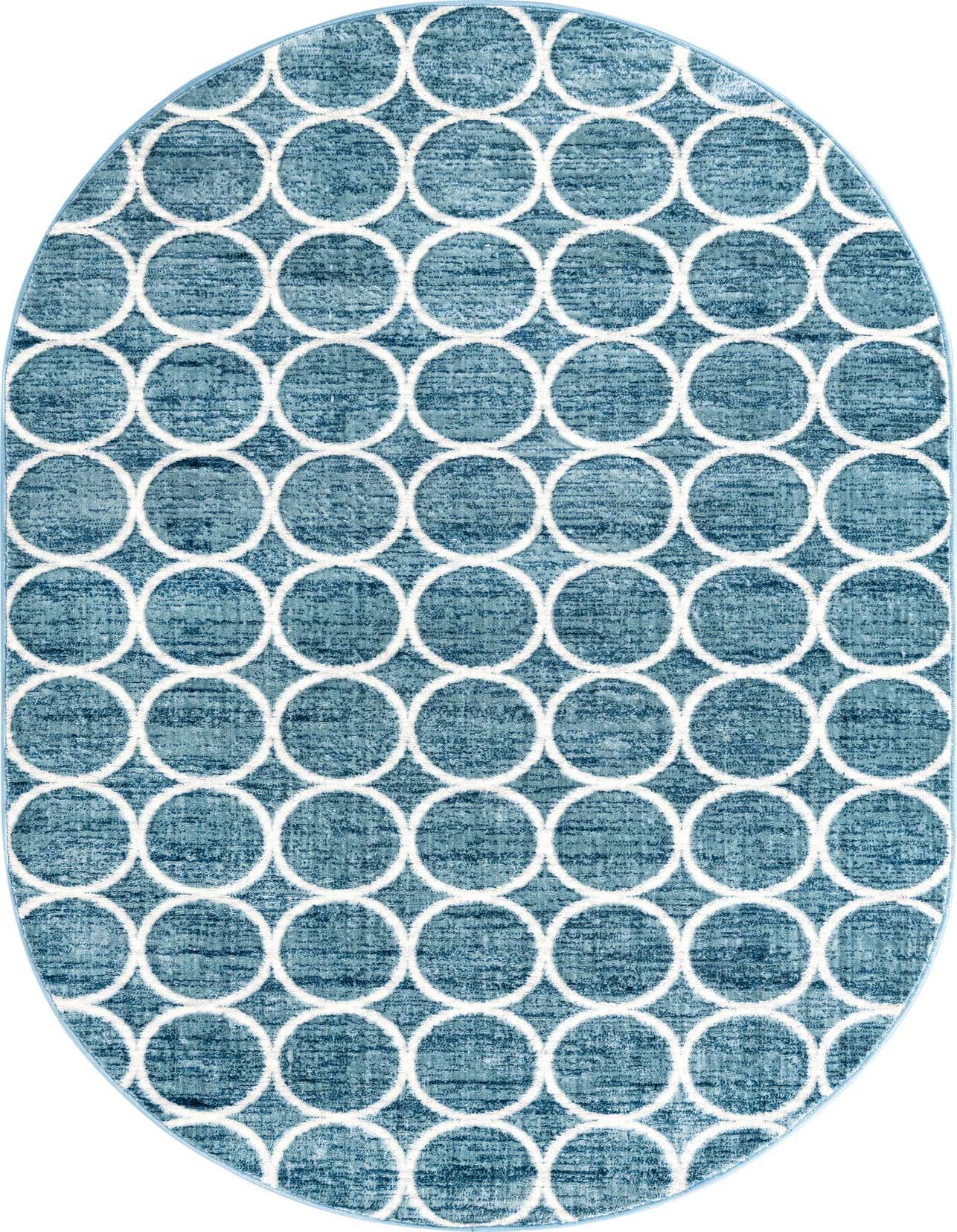 A 5' 3 x 8' 0 oval blue area rug with a white geometric trellis pattern, featuring textured pile.