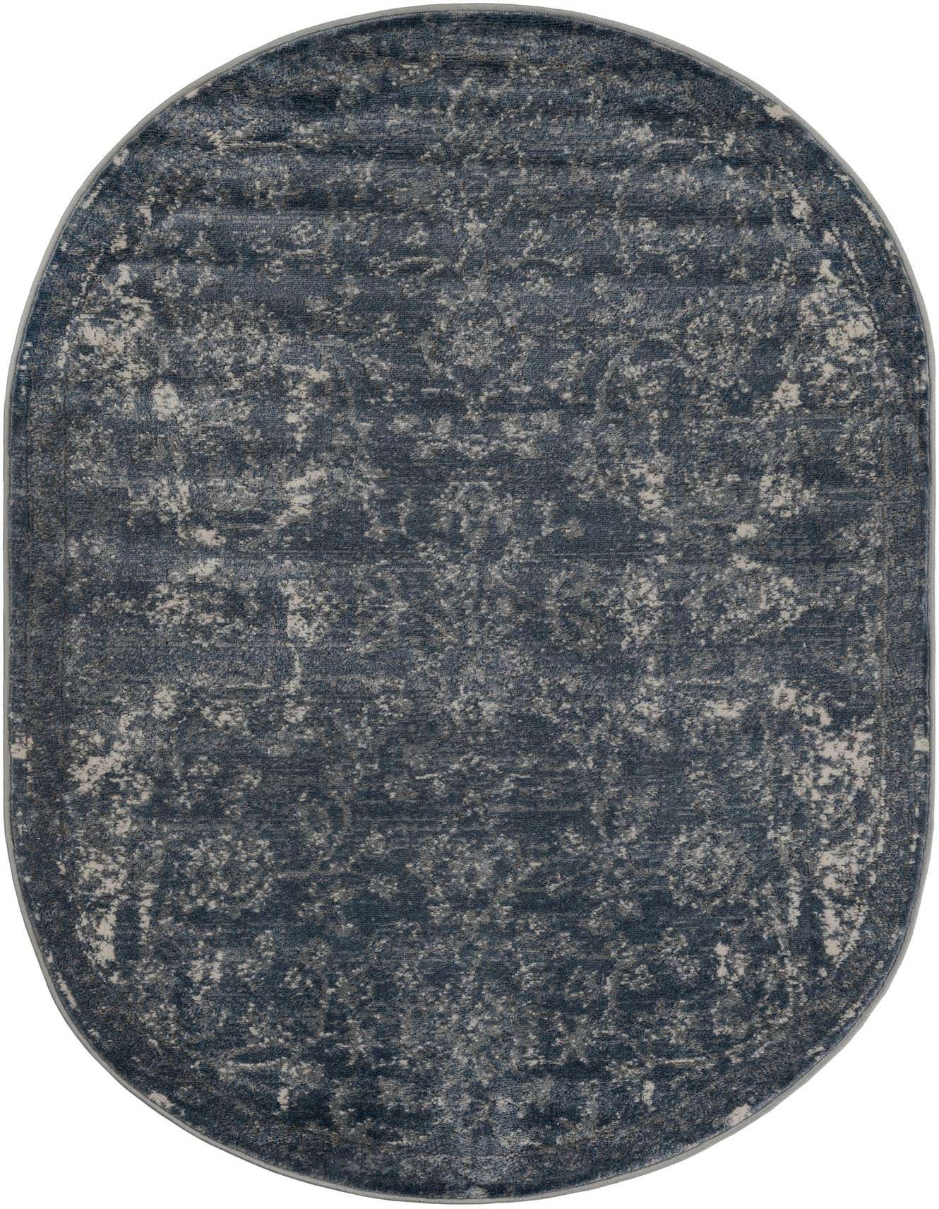 An oval 4'1" x 6'1" blue area rug with a distressed botanical pattern in shades of blue and cream.