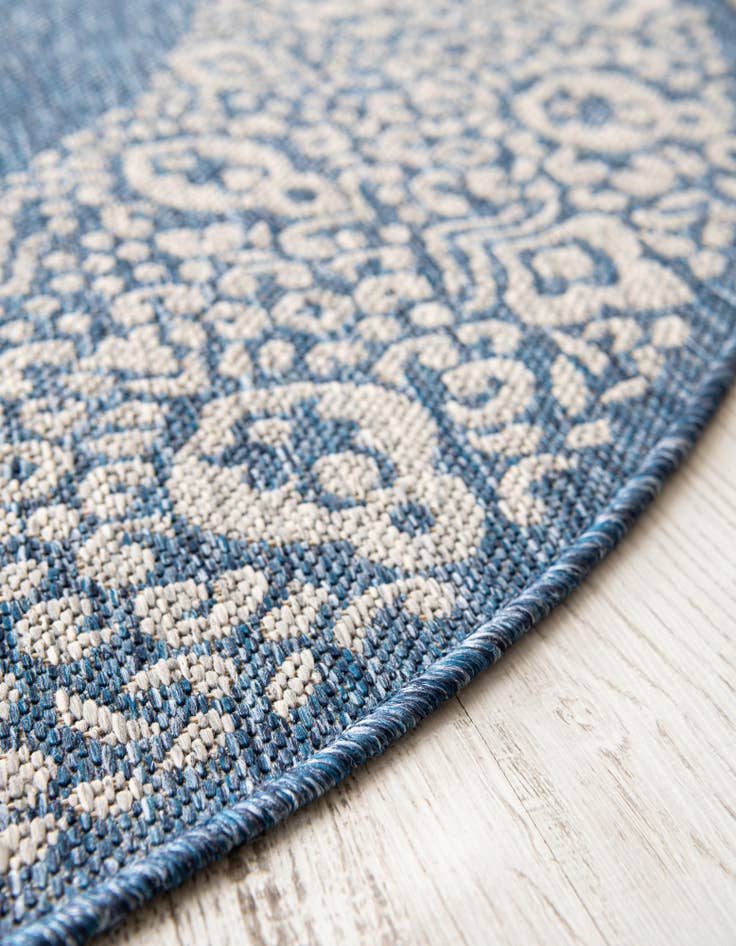 Detail image of  5' 3 x 8'  Washable Border Indoor / Outdoor Oval Rug