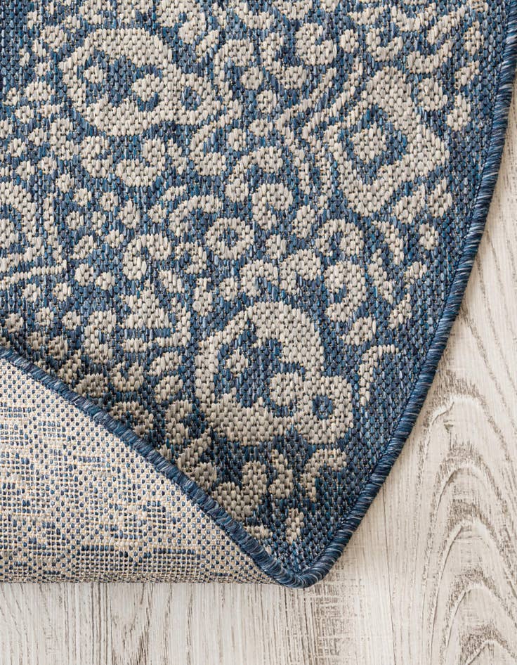 Detail image of  5' 3 x 8'  Washable Border Indoor / Outdoor Oval Rug
