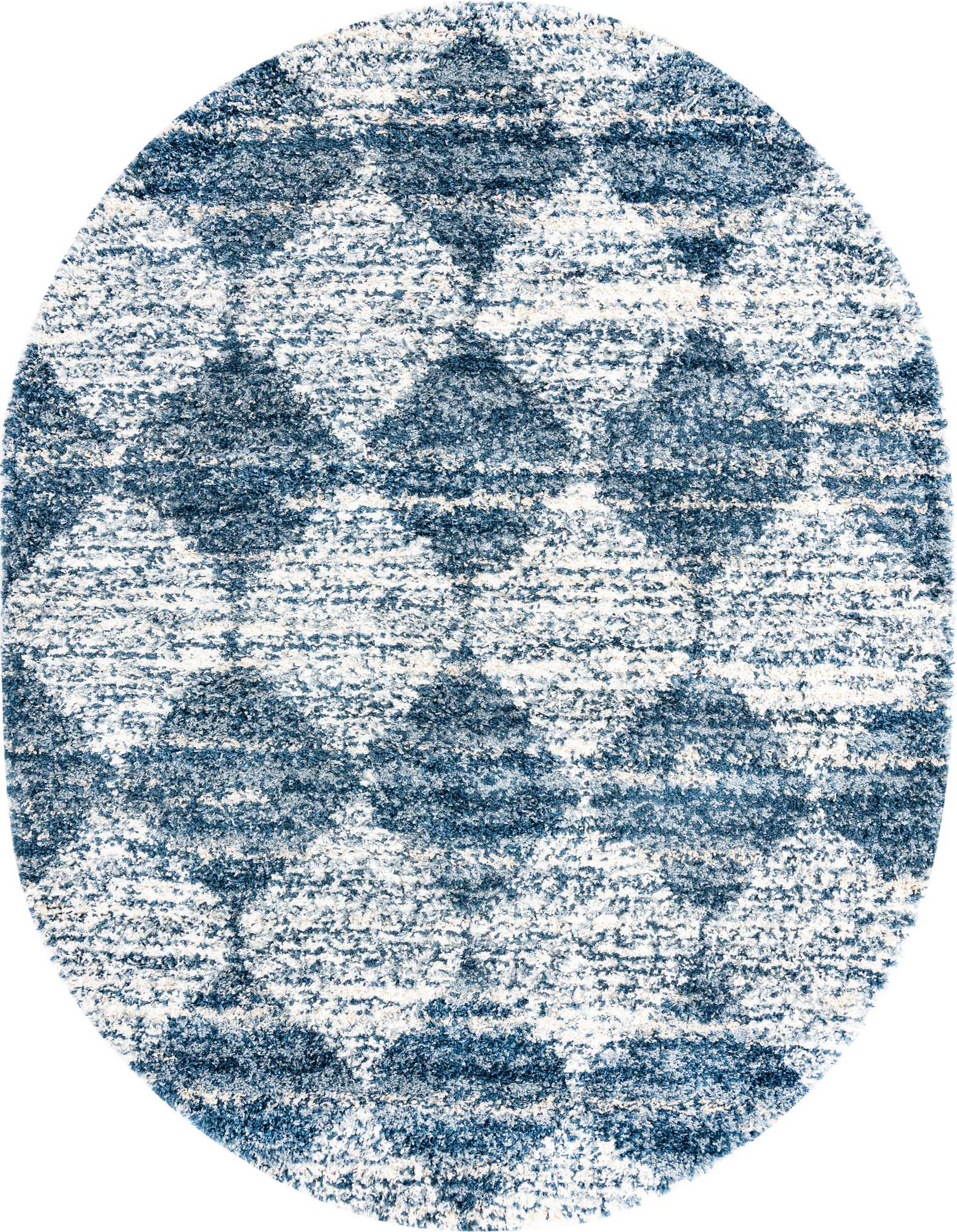 A soft, plush oval shag rug in varying shades of blue and white, featuring a modern trellis pattern.