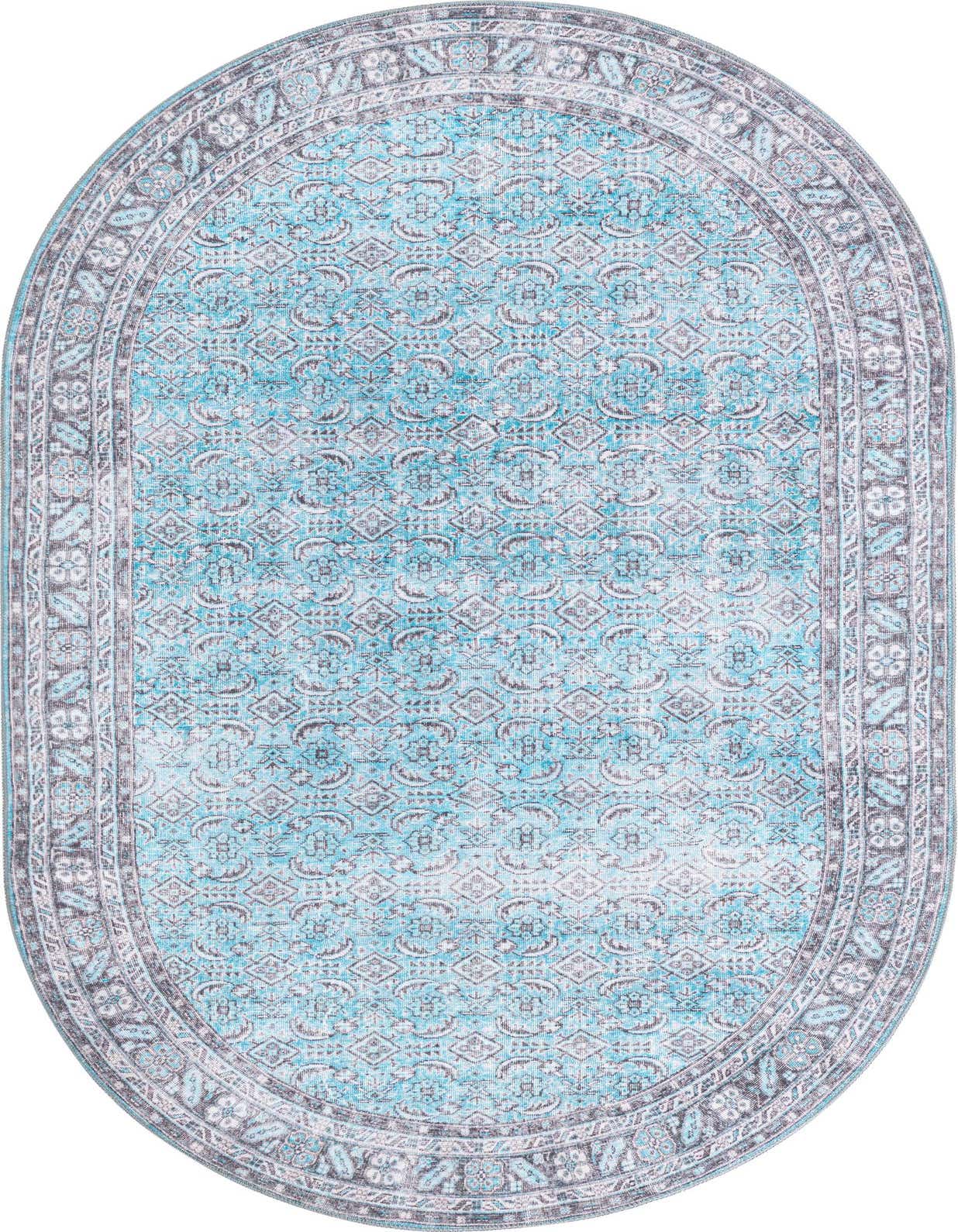 A 5'x8' oval blue area rug with a distressed traditional floral and geometric pattern and a decorative border.