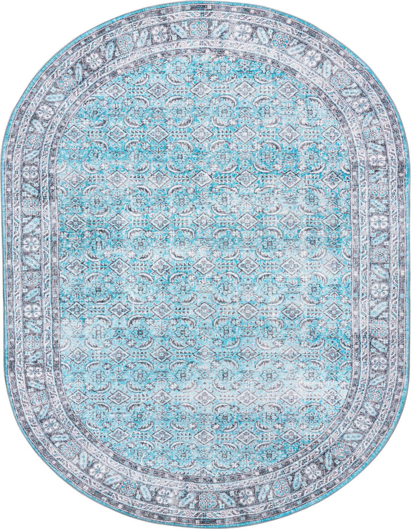 An oval 7' 6 x 10' 6 blue traditional rug with a distressed floral and geometric pattern and a dark border.