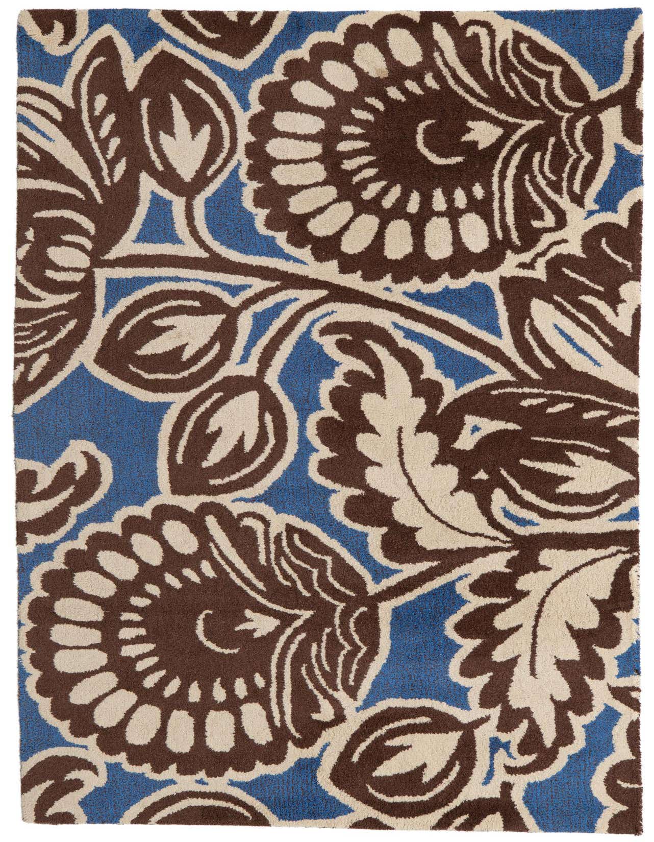 A 5x7 rectangular Agra rug with a high pile, featuring a bold blue background with large brown and cream floral and botanical patterns.