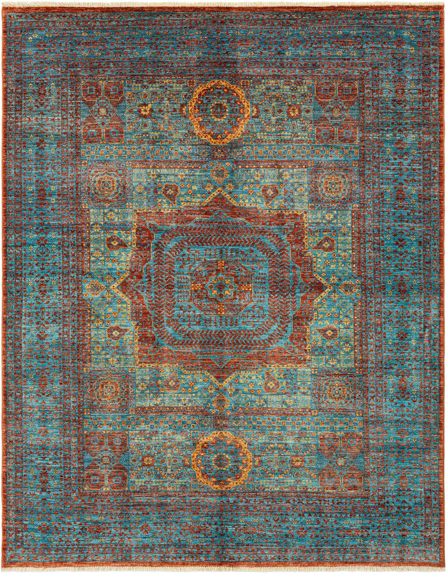 A rectangular handmade Persian rug in shades of blue and rust, featuring intricate traditional patterns and a central medallion.