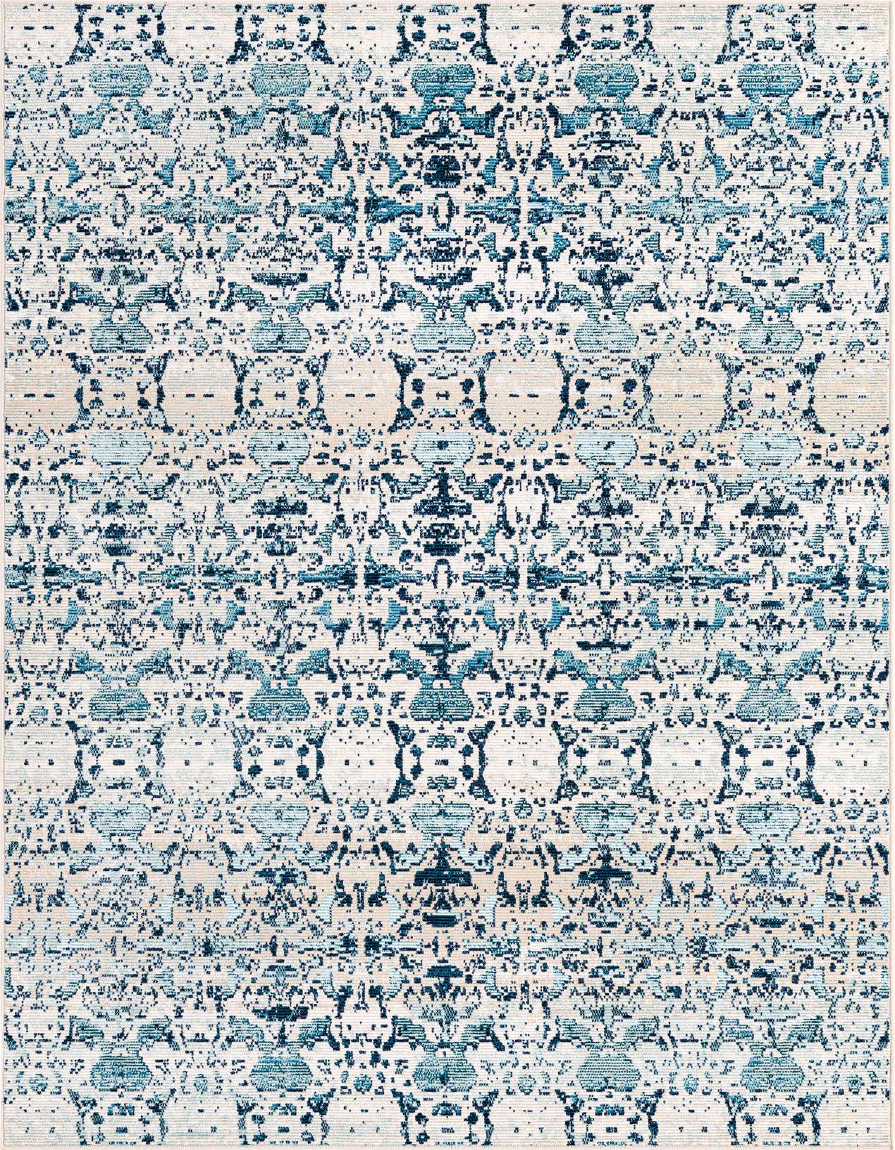 A 5x8 rectangular Amulet collection rug featuring a distressed bohemian medallion pattern in various shades of blue and cream.