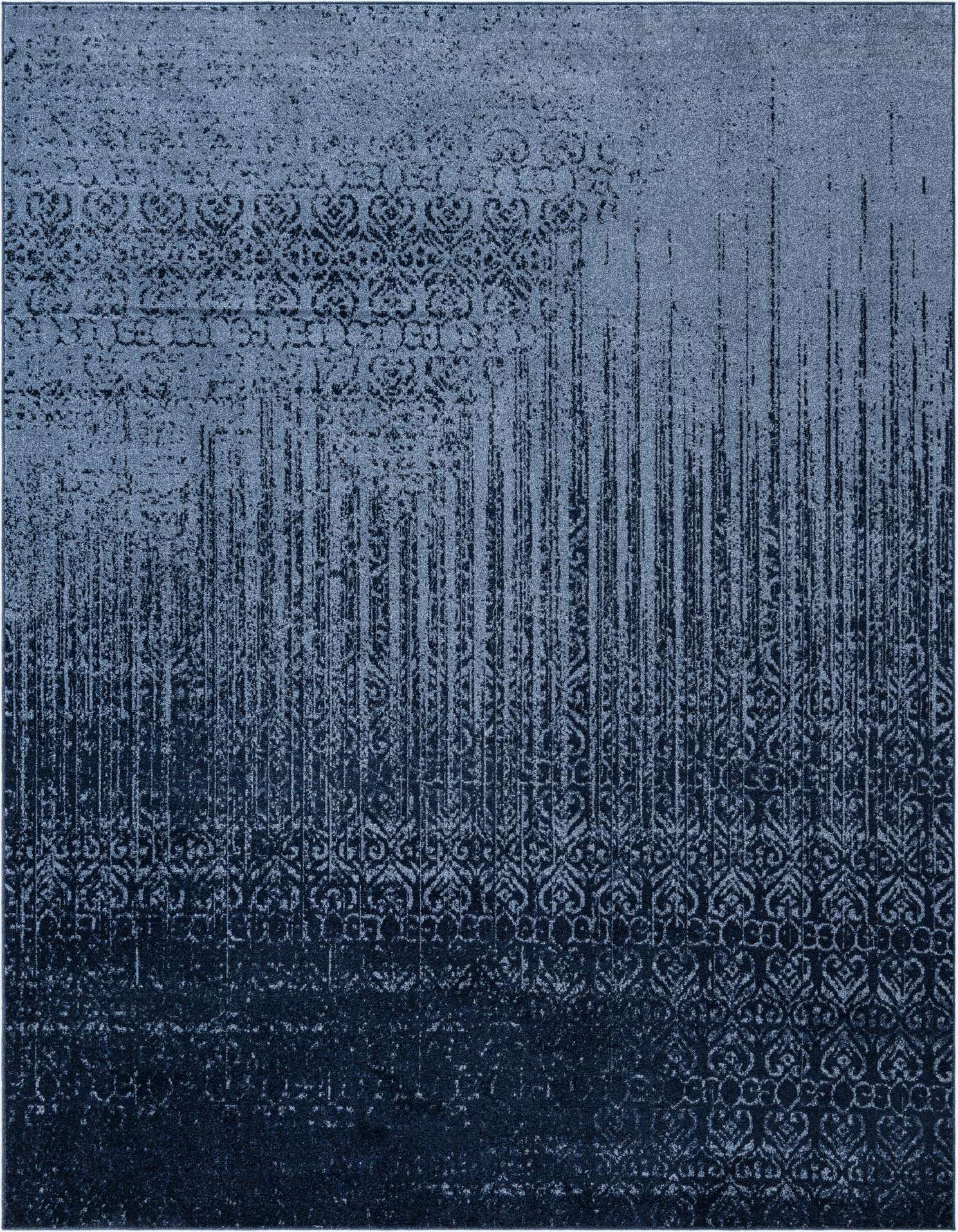 A 9x12 rectangular Rugs.com Angelica rug featuring an abstract transitional pattern in varying shades of blue, with a medium pile.