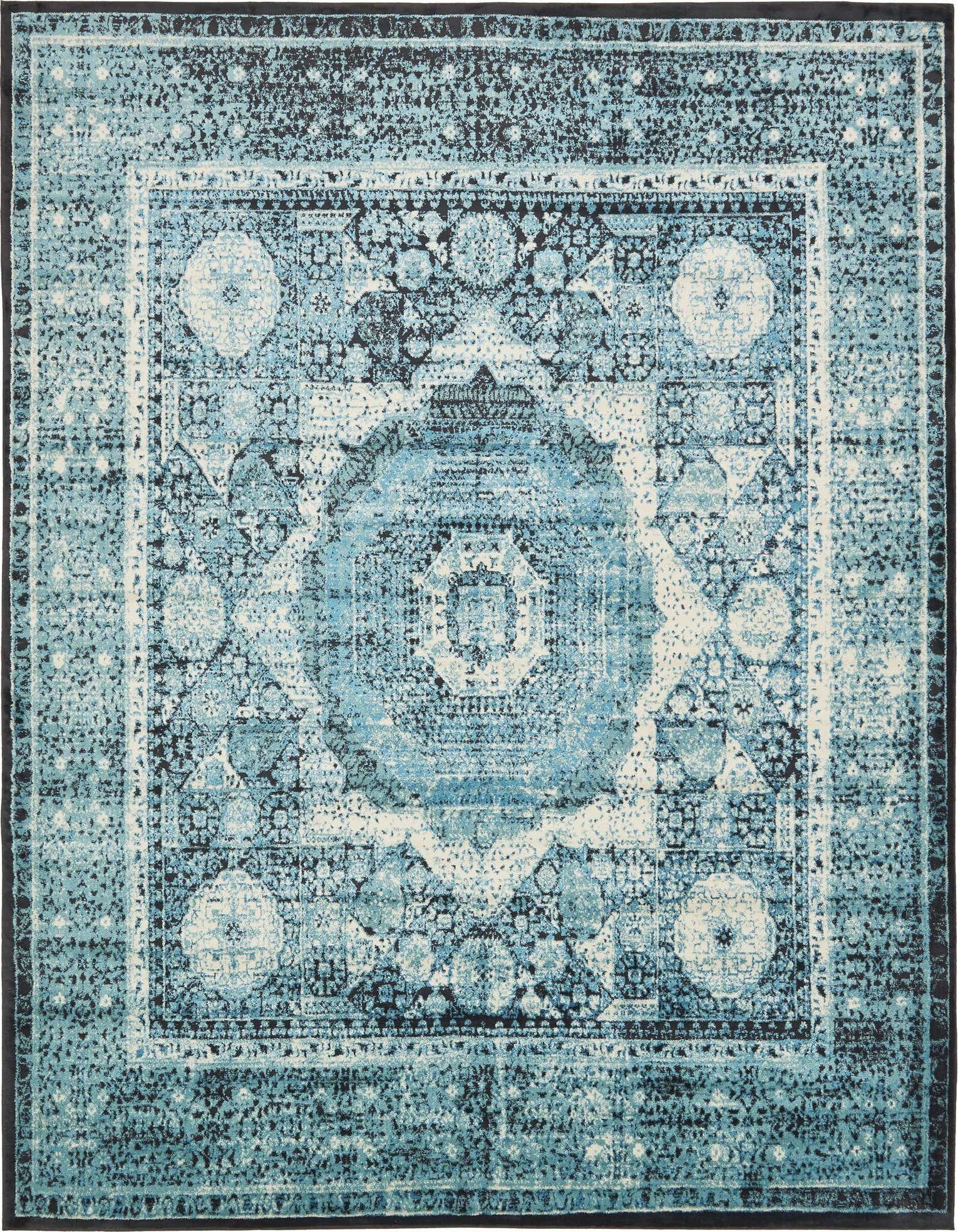 A 10x13 rectangular blue area rug with a distressed medallion and botanical pattern, featuring shades of light and dark blue with white accents.