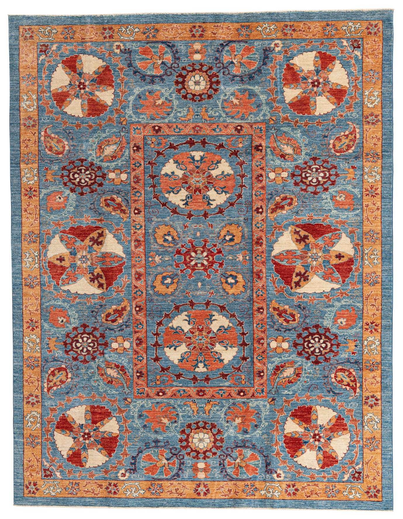 A 7x10 rectangular Ariana Ziegler rug featuring an intricate blue, orange, and red botanical and oriental pattern.