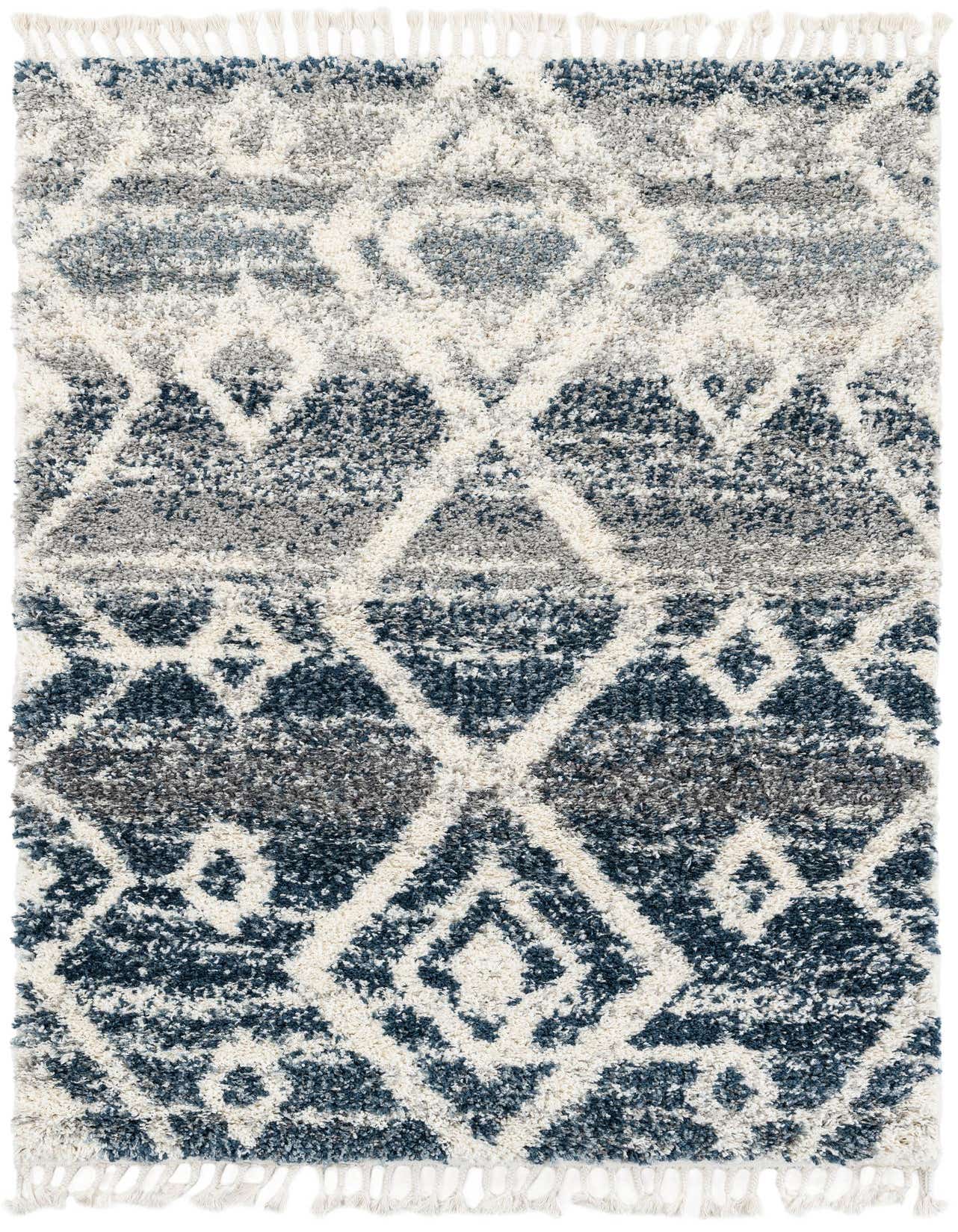 A 5x8 rectangular blue and white shag area rug with a modern geometric diamond pattern and fringed edges.