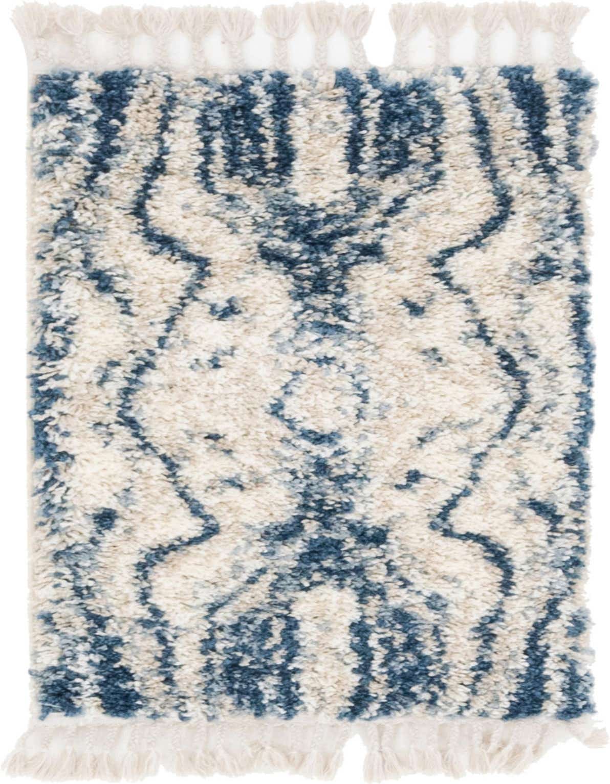 A 2x3 rectangular Athena Shag rug featuring a modern coastal blue and cream striped pattern with tassels.