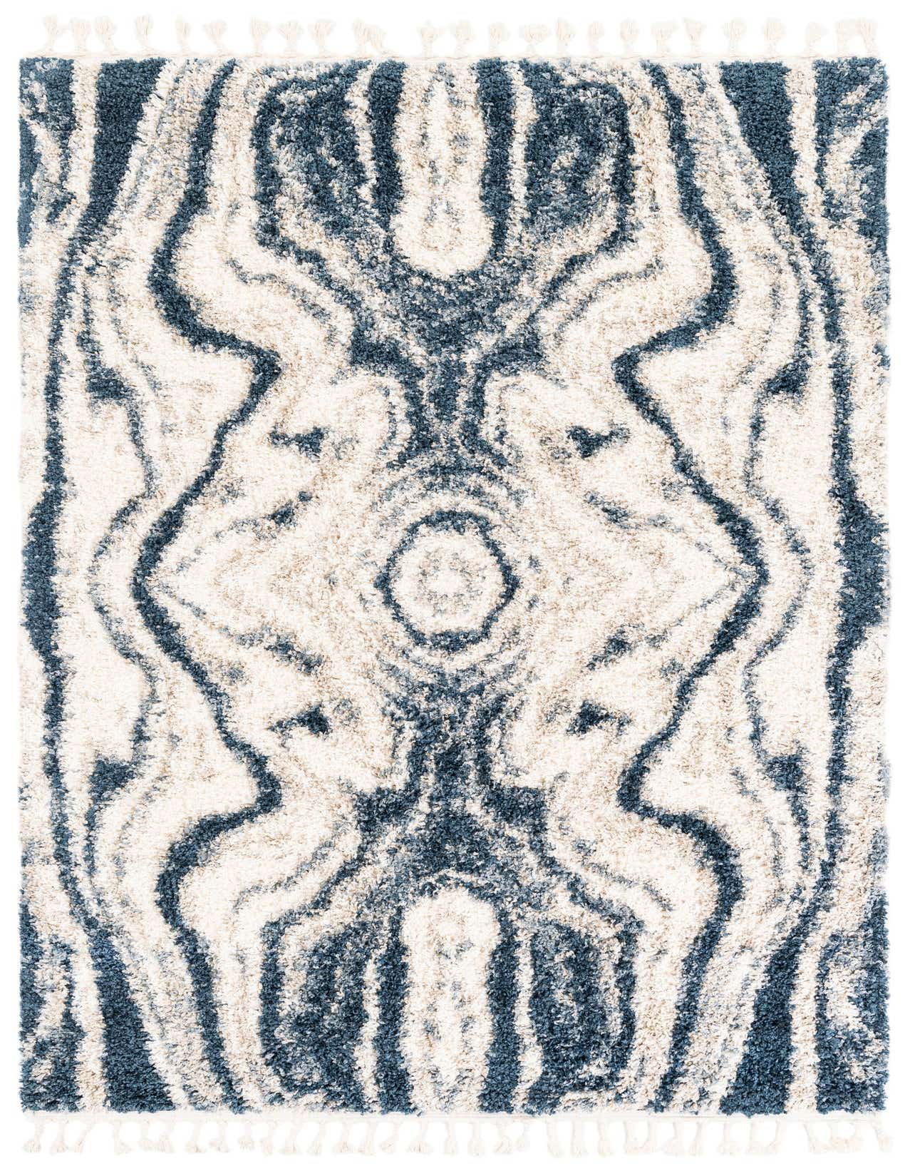 A 5x8 rectangular Athena Shag rug featuring a dynamic blue and cream striped pattern with tassels, ideal for a modern living room.