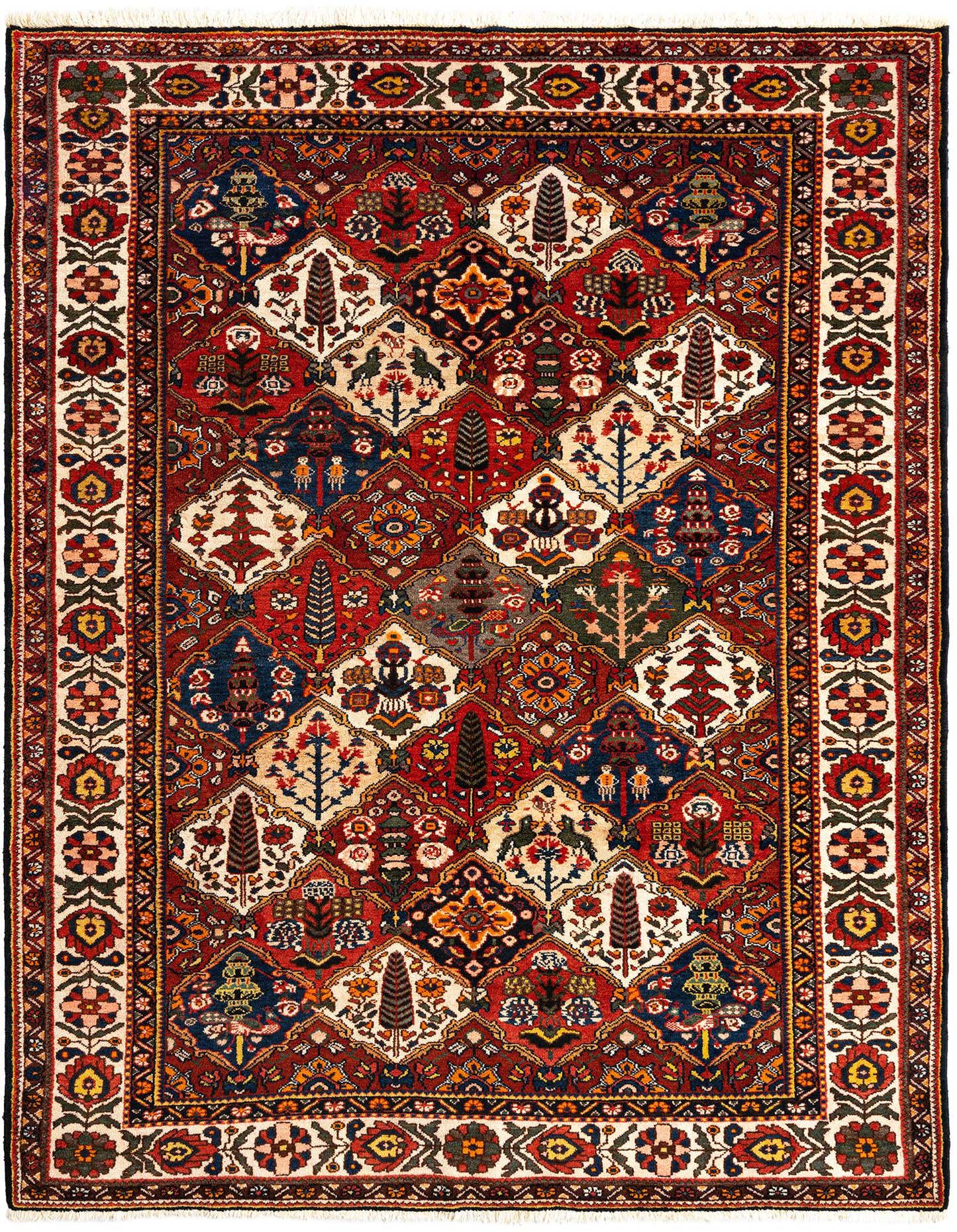 A 7x10 rectangular Persian wool rug with a complex geometric and floral pattern in rich blues, reds, and creams.
