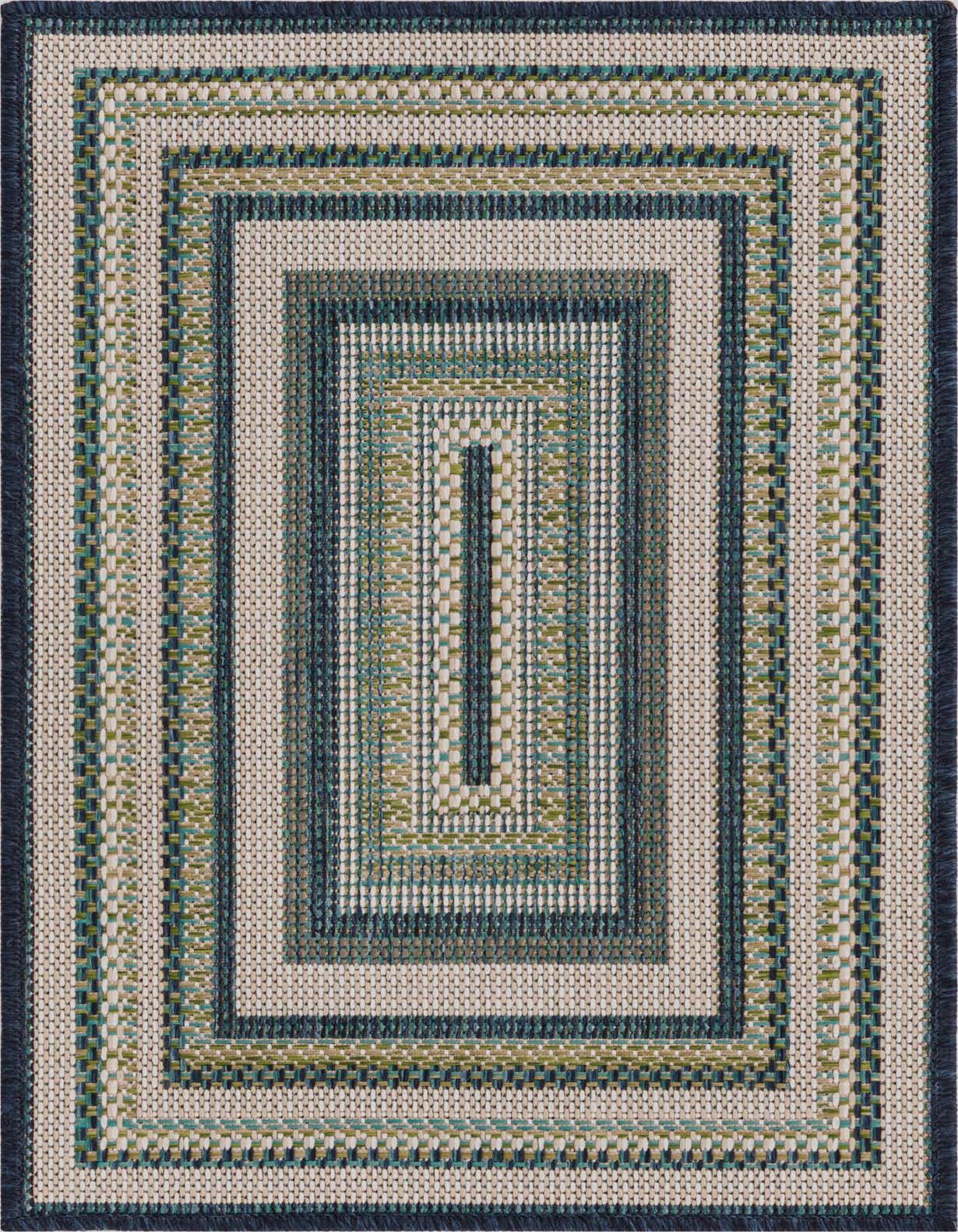 A 2x3 rectangular Baja Outdoor rug featuring a modern striped pattern in various shades of blue and natural tones, ideal for indoor or outdoor use.