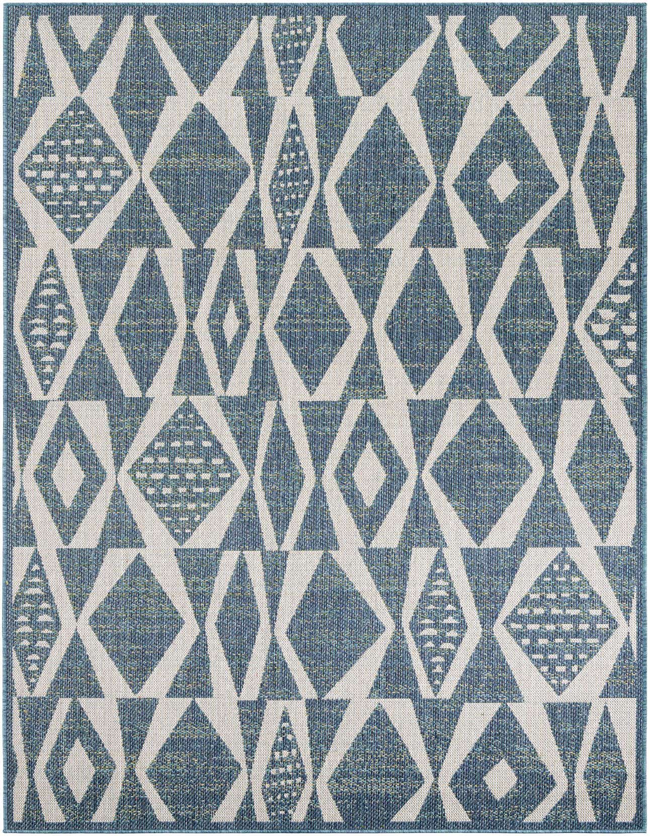A 6x9 rectangular Baja Outdoor rug featuring a modern geometric pattern in varying shades of blue and off-white, suitable for indoor or outdoor spaces.