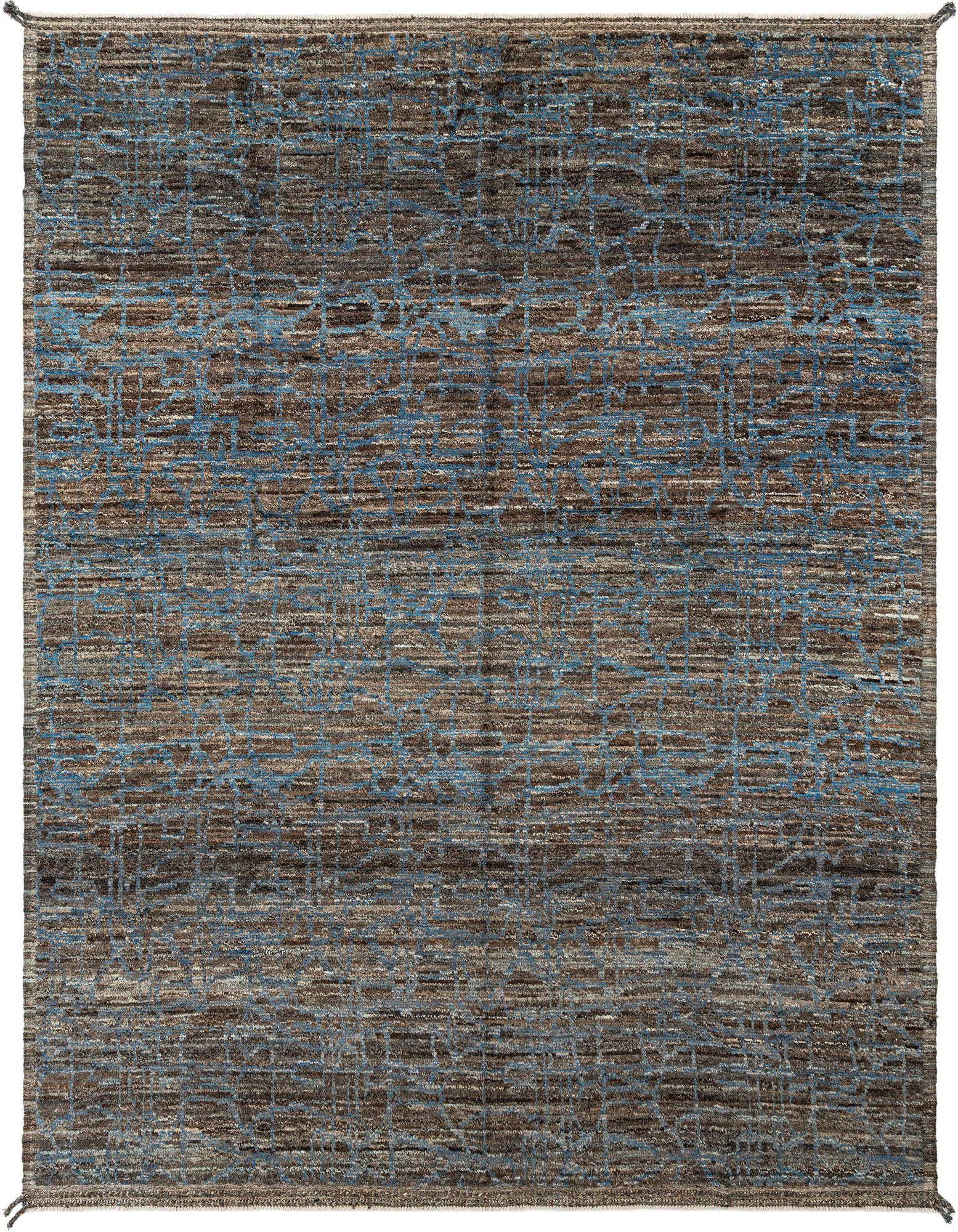 A rectangular Beni Marok wool rug featuring a distressed Persian pattern in shades of blue and brown.