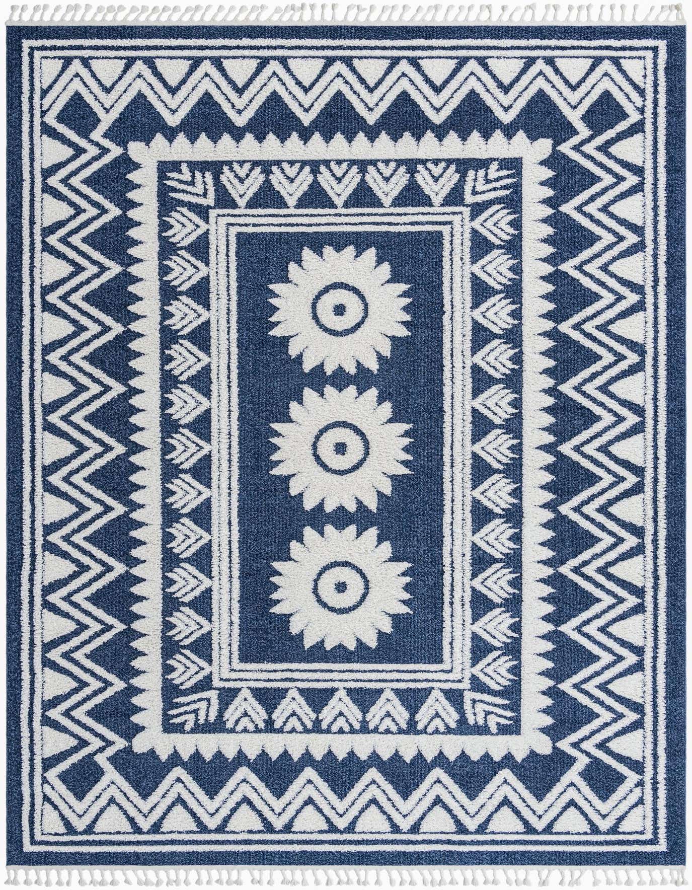 A 10x14 rectangular blue and white Southwestern rug with a tribal pattern, featuring a central column of three white floral medallions and zigzag borders.