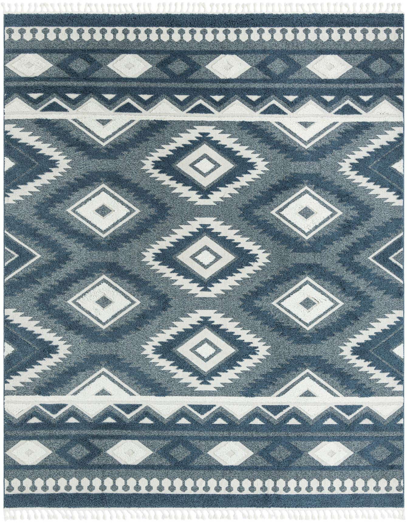 A 10x14 rectangular blue and white Southwestern Bohemian rug with tribal patterns and a textured pile.