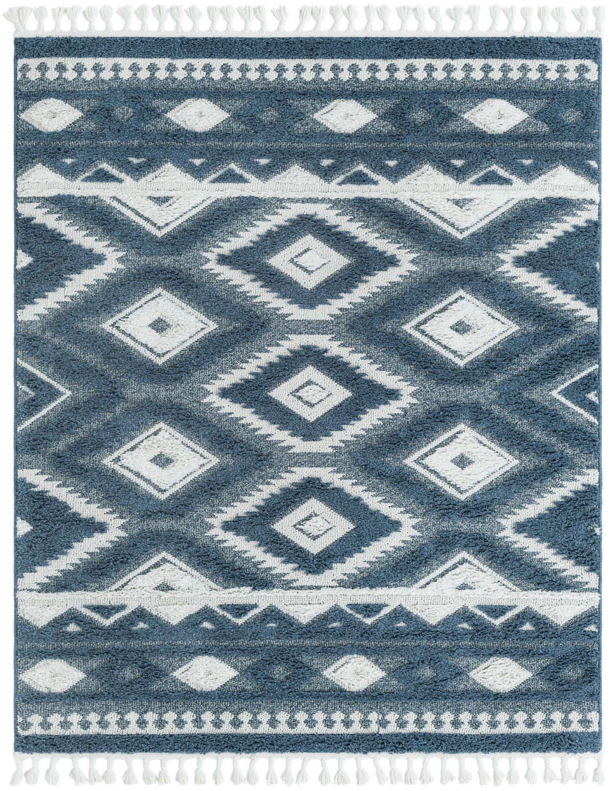 A 5x8 rectangular indoor rug with a blue and white Southwestern tribal pattern, featuring diamond and zigzag motifs, and white fringed edges.