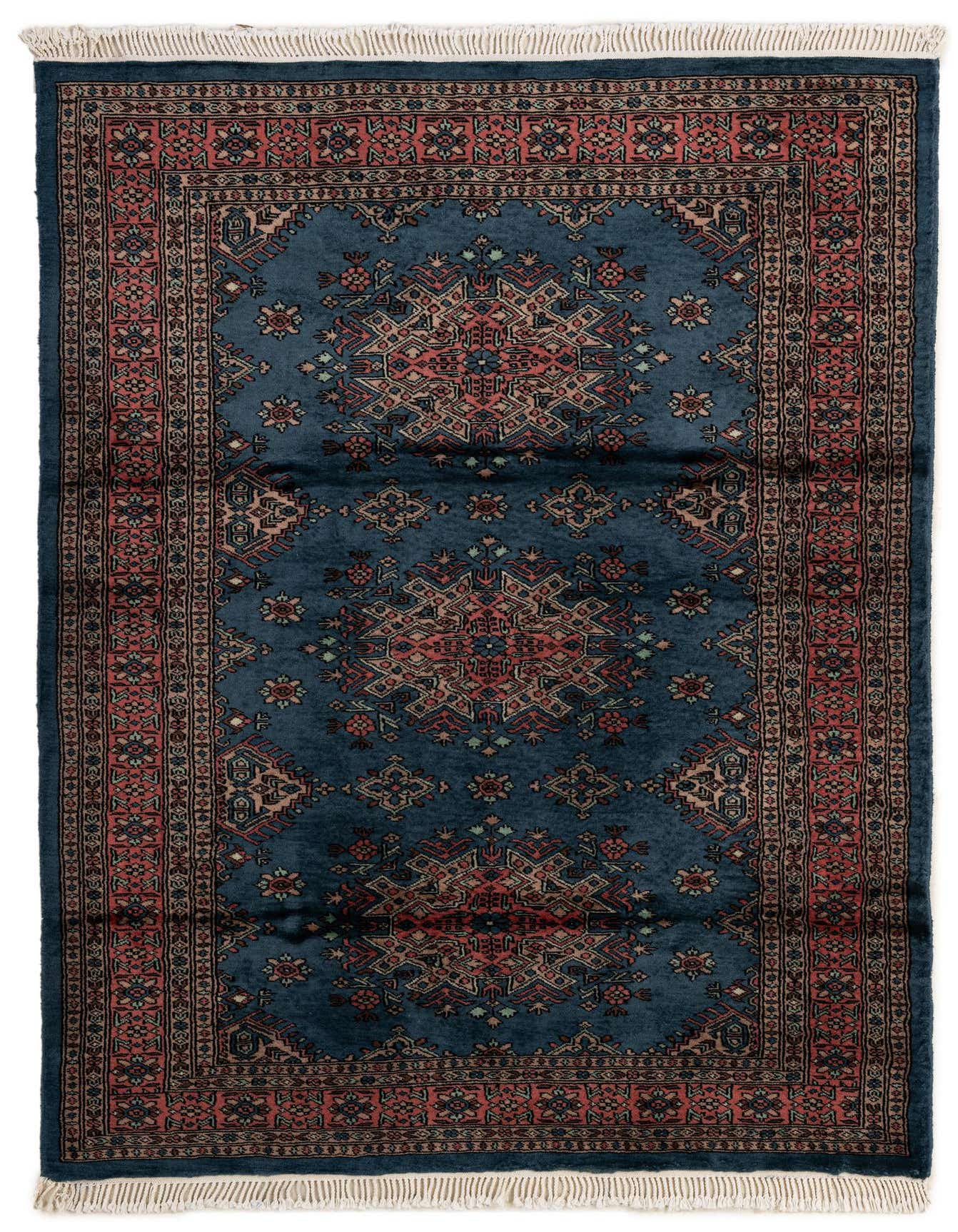 A 4x6 rectangular Bokhara wool rug in deep blue with traditional tribal patterns in red, beige, and black, featuring white fringe.