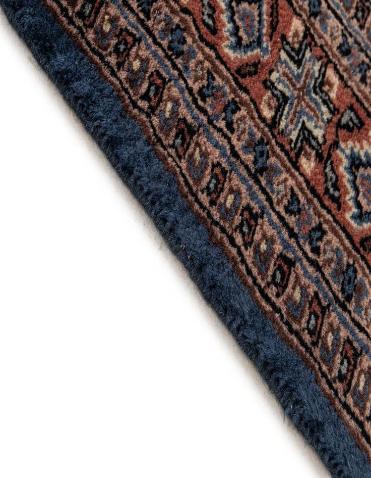 Detail image of  4' 2 x 6' 7  Hand Knotted Bokhara Wool Rug