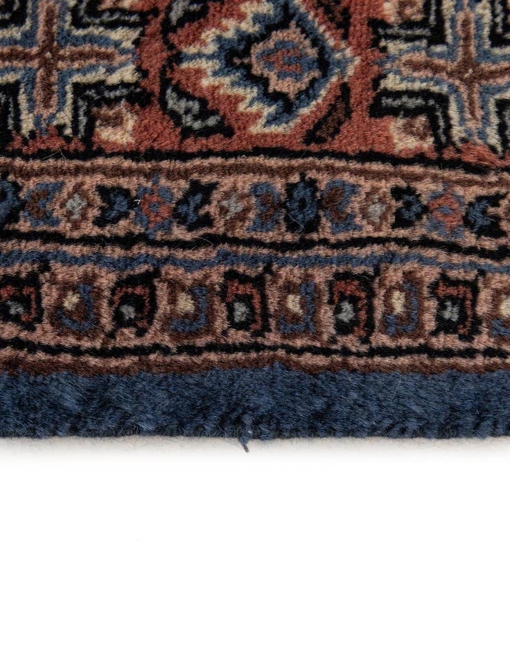 Detail image of  4' 2 x 6' 7  Hand Knotted Bokhara Wool Rug
