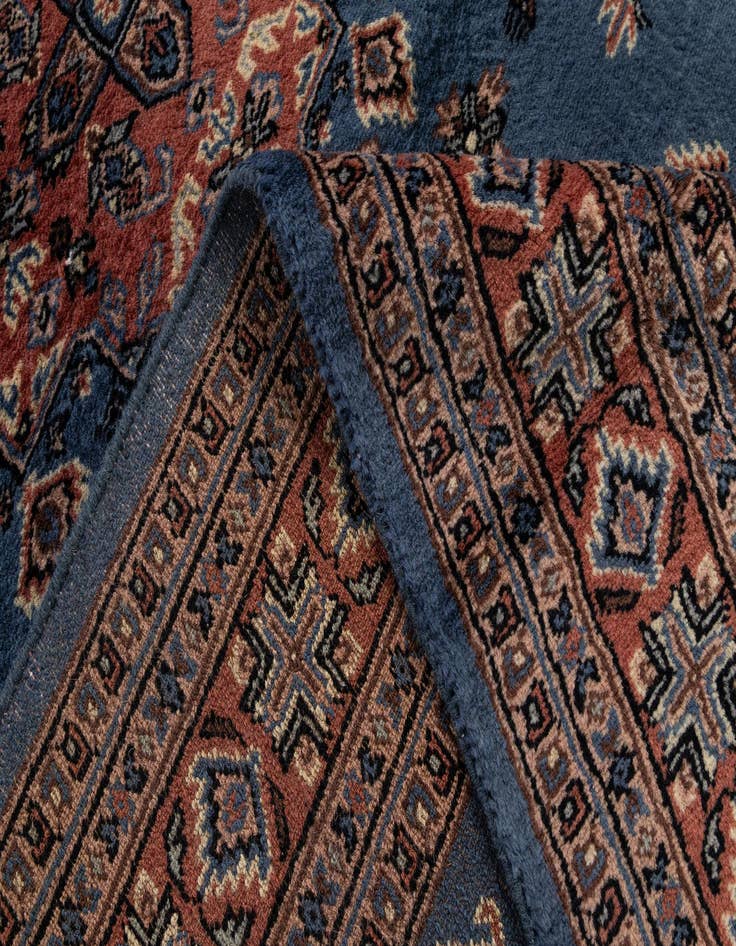 Detail image of  4' 2 x 6' 7  Hand Knotted Bokhara Wool Rug