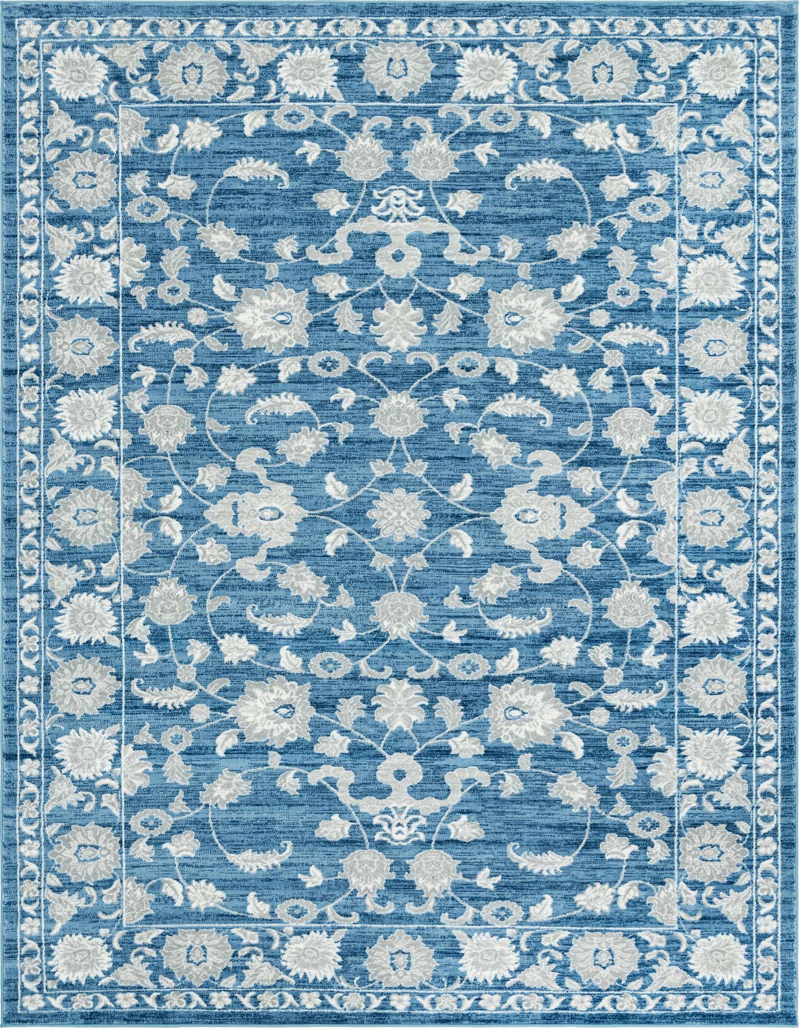 A 9x12 rectangular blue area rug with a traditional floral and botanical pattern in light grey and white, featuring a textured pile.