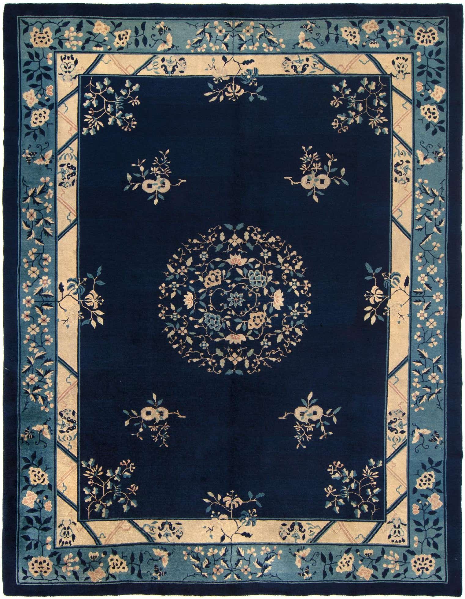 A 9x12 rectangular China Peking wool rug featuring a deep blue field with a central floral medallion and intricate light blue and beige borders.