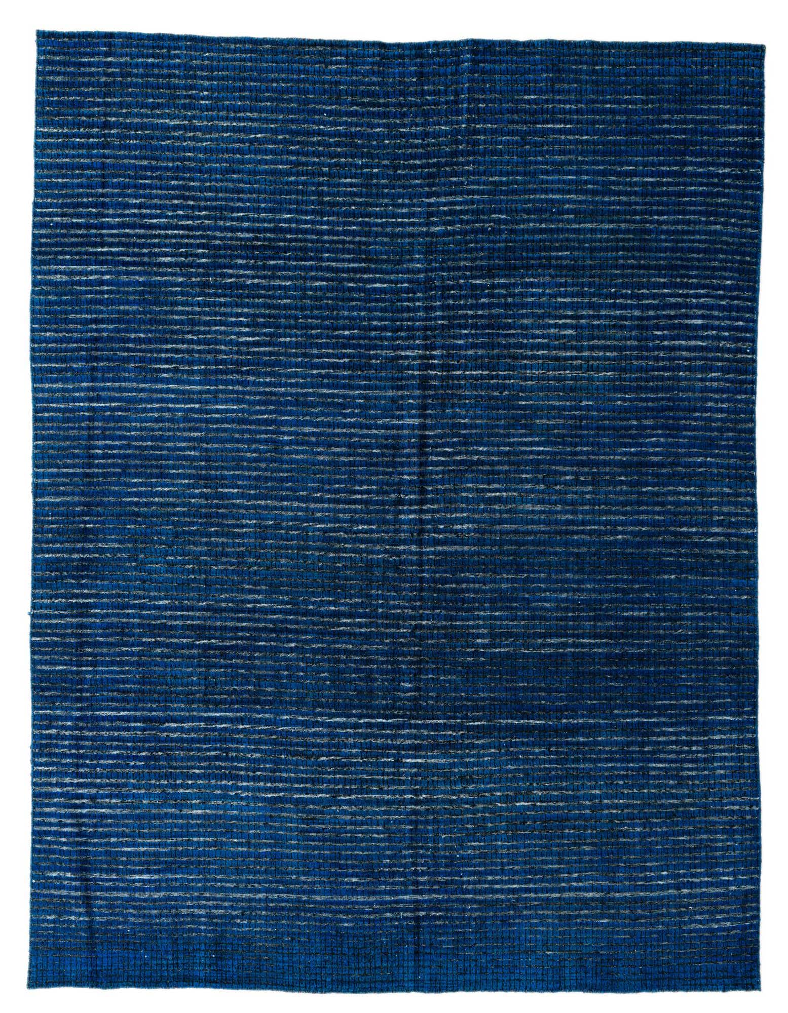 A rectangular 8x10 Darya rug from Rugs.com, featuring a modern abstract pattern with varying shades of blue and subtle horizontal white lines, perfect for a living room.