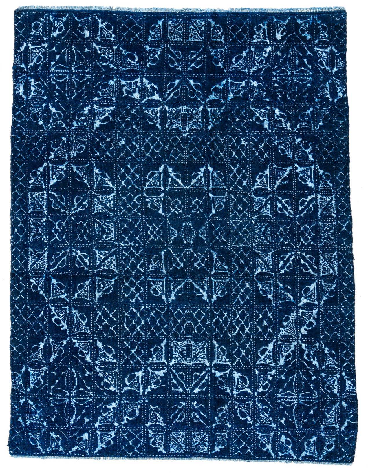 A 5x8 rectangular Darya rug in deep blues with a textured modern oriental pattern, suitable for a living room.